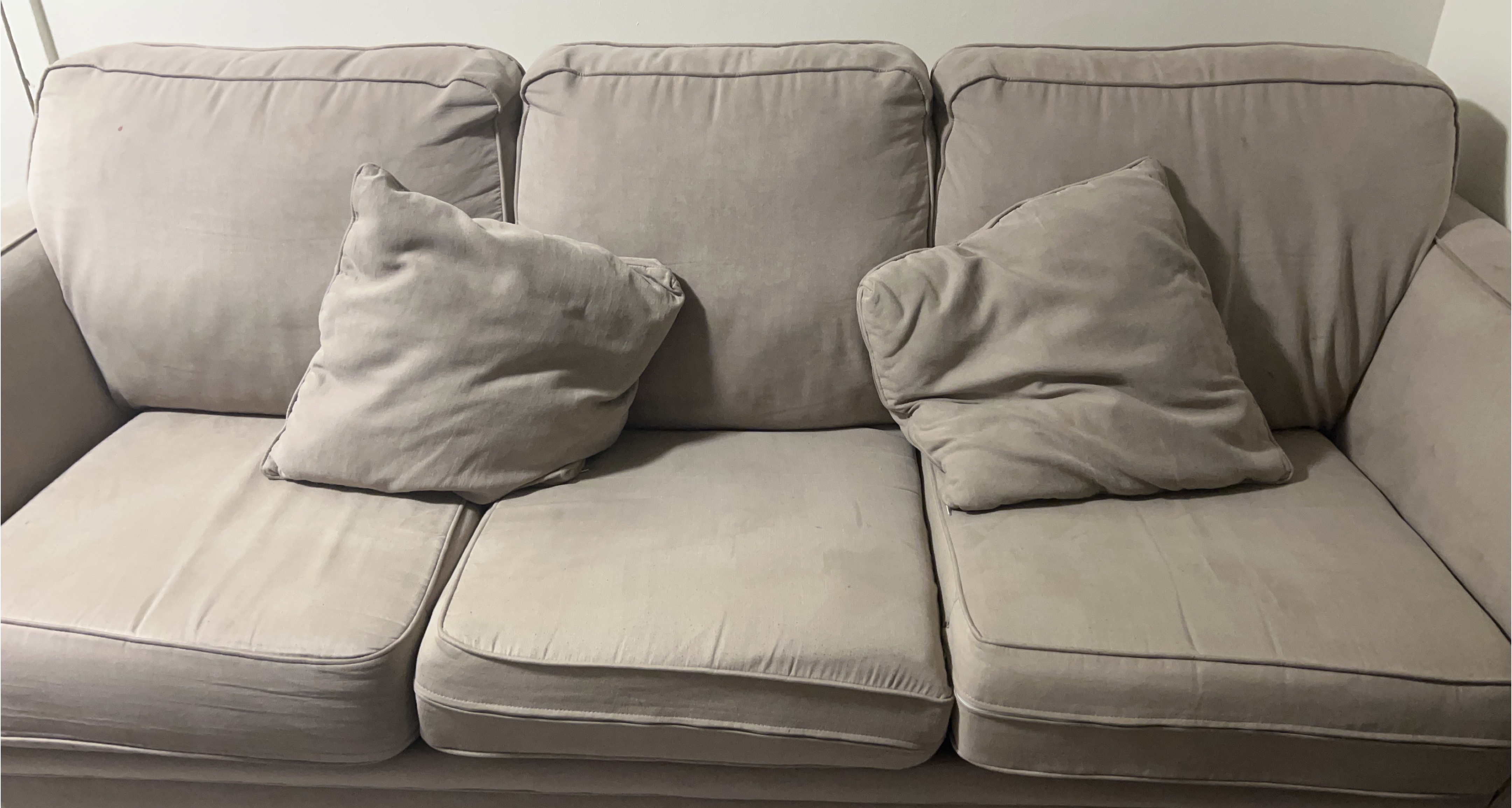 Light Beige Sofa with Throw Pillows