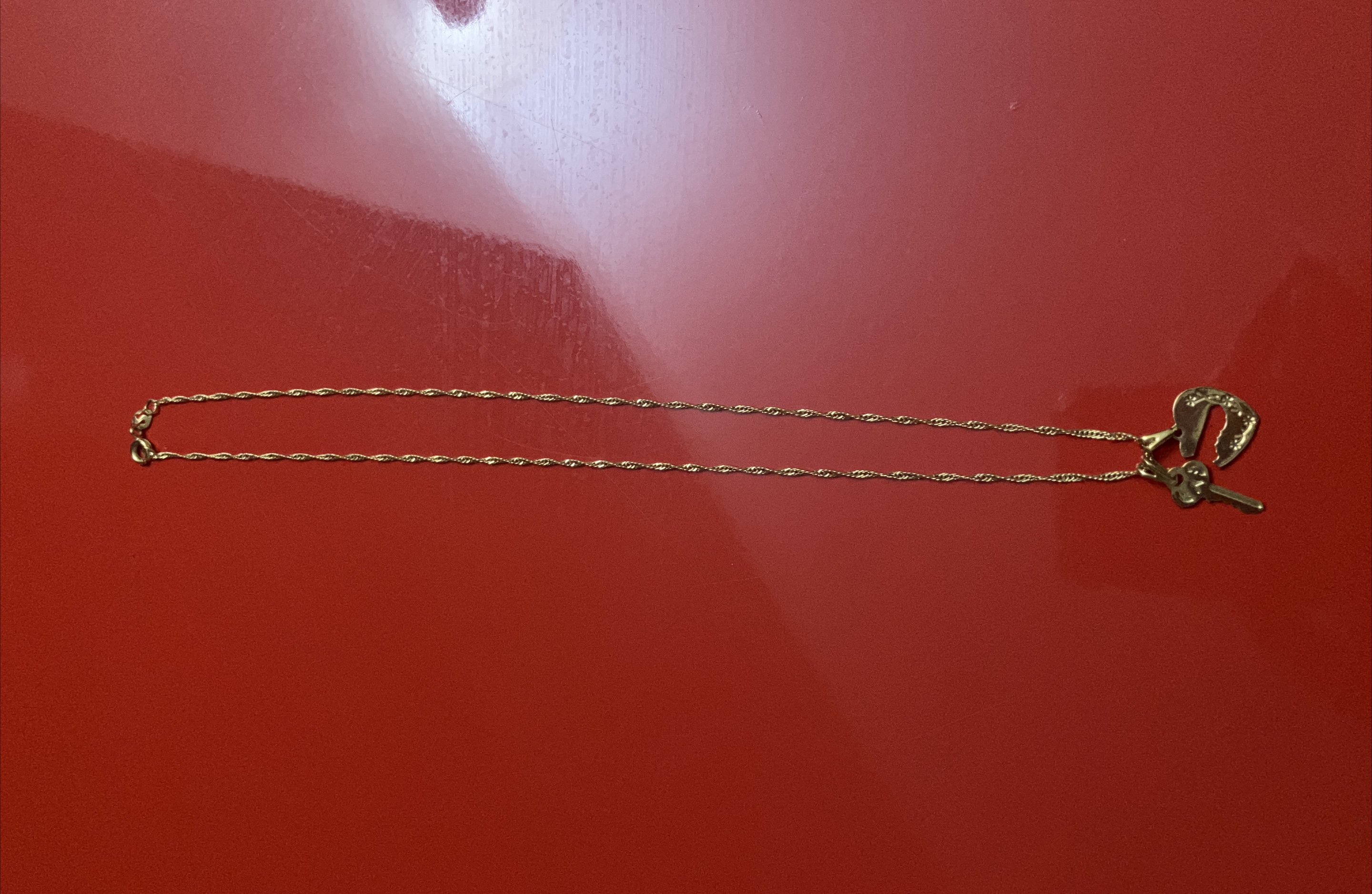 Gold Necklace with Key and Heart Pendant thumbnail
