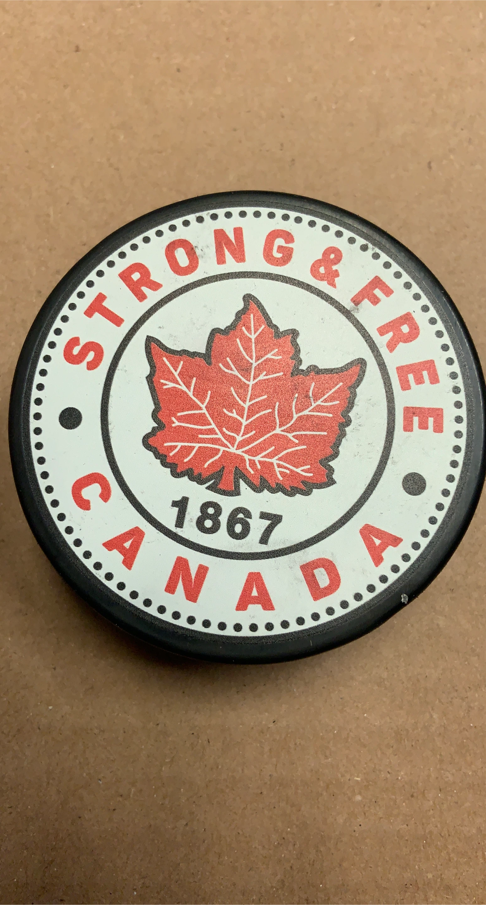Strong & Free 1867 Canada Hockey Puck