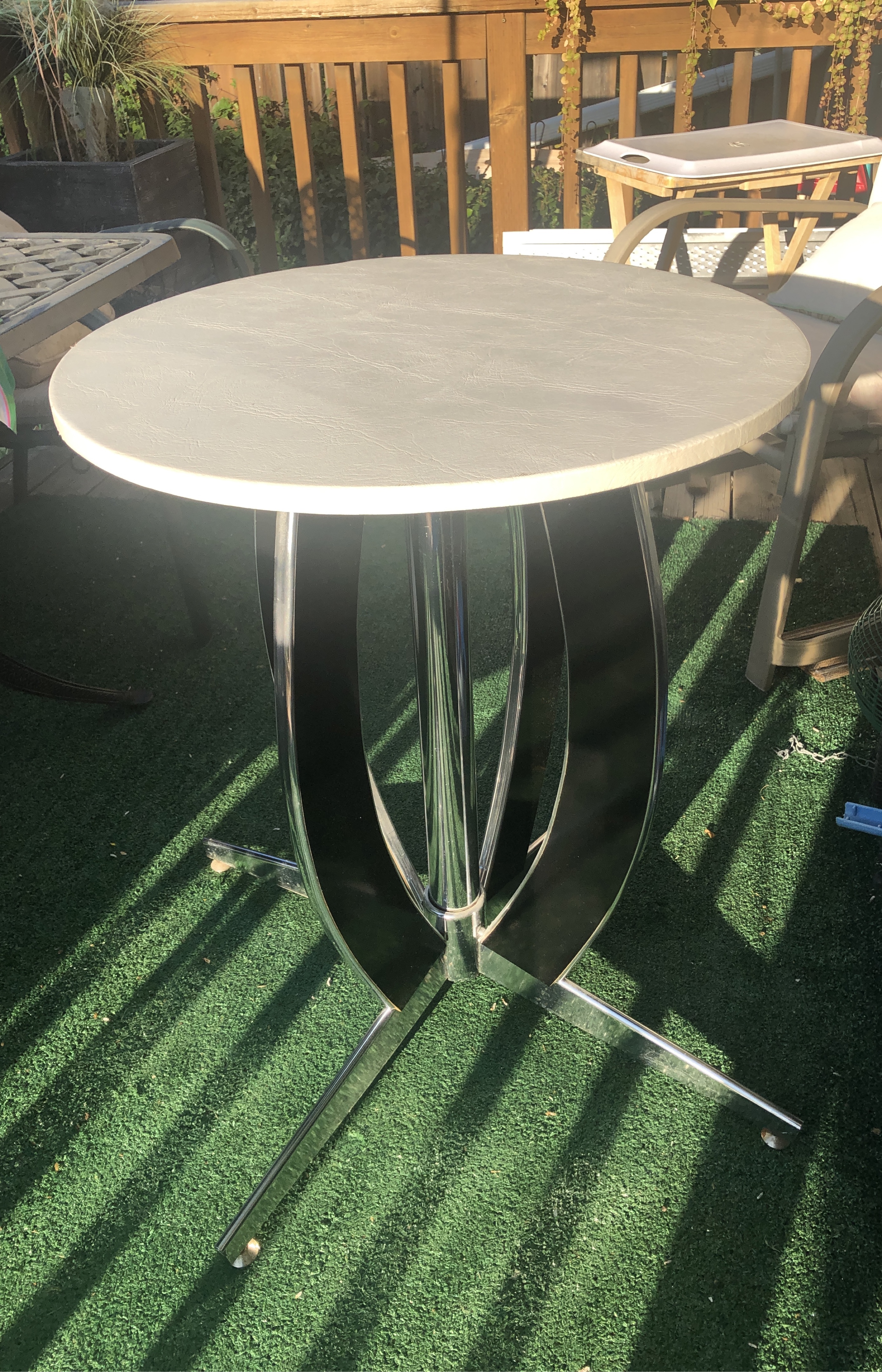 Round Bistro Table  with black and chrome base. thumbnail