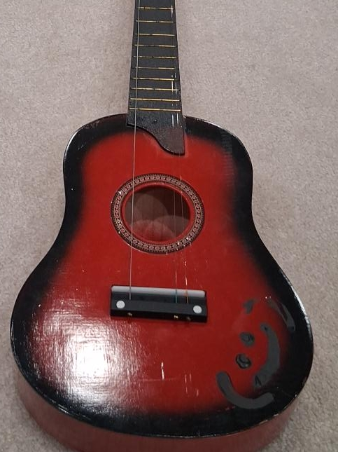 Red & Black Toy Guitar thumbnail