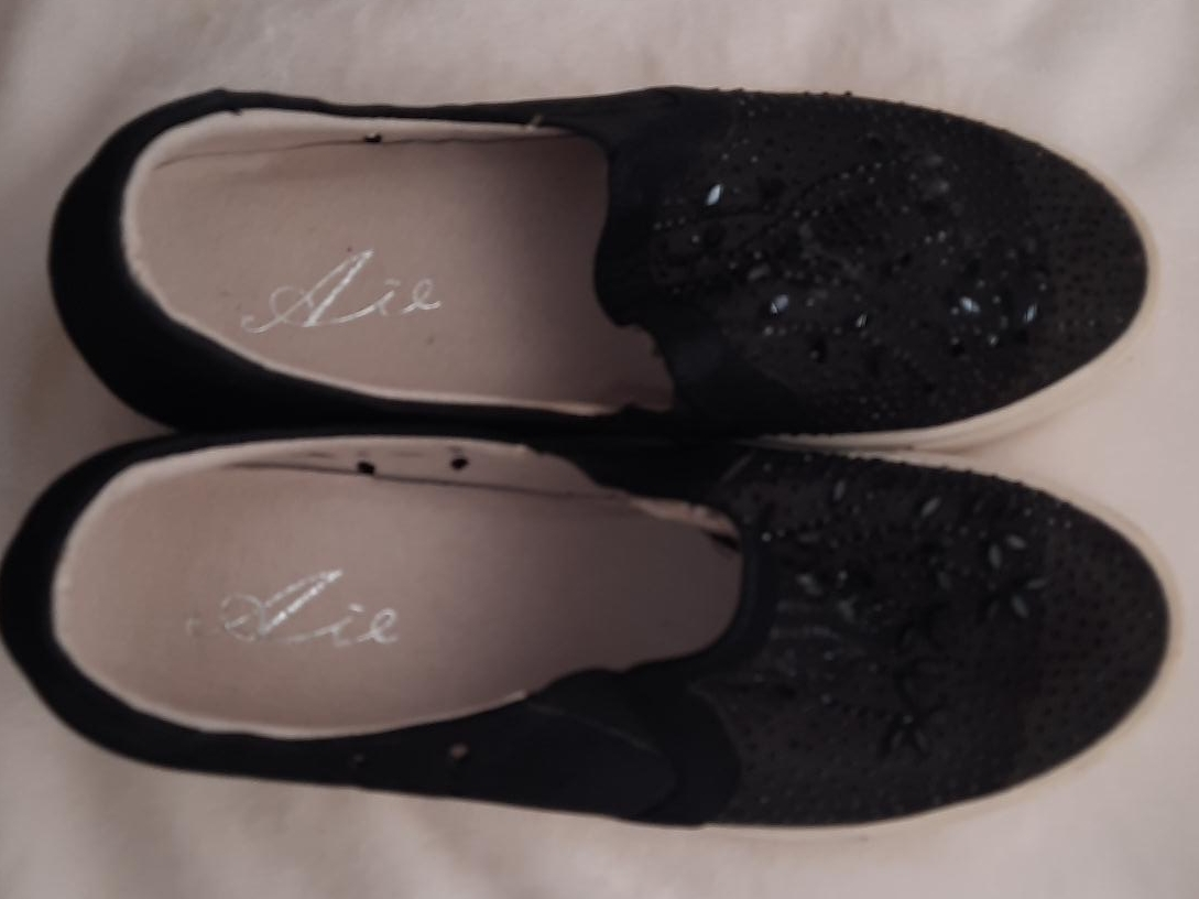 Aie Black Slip-On Shoes