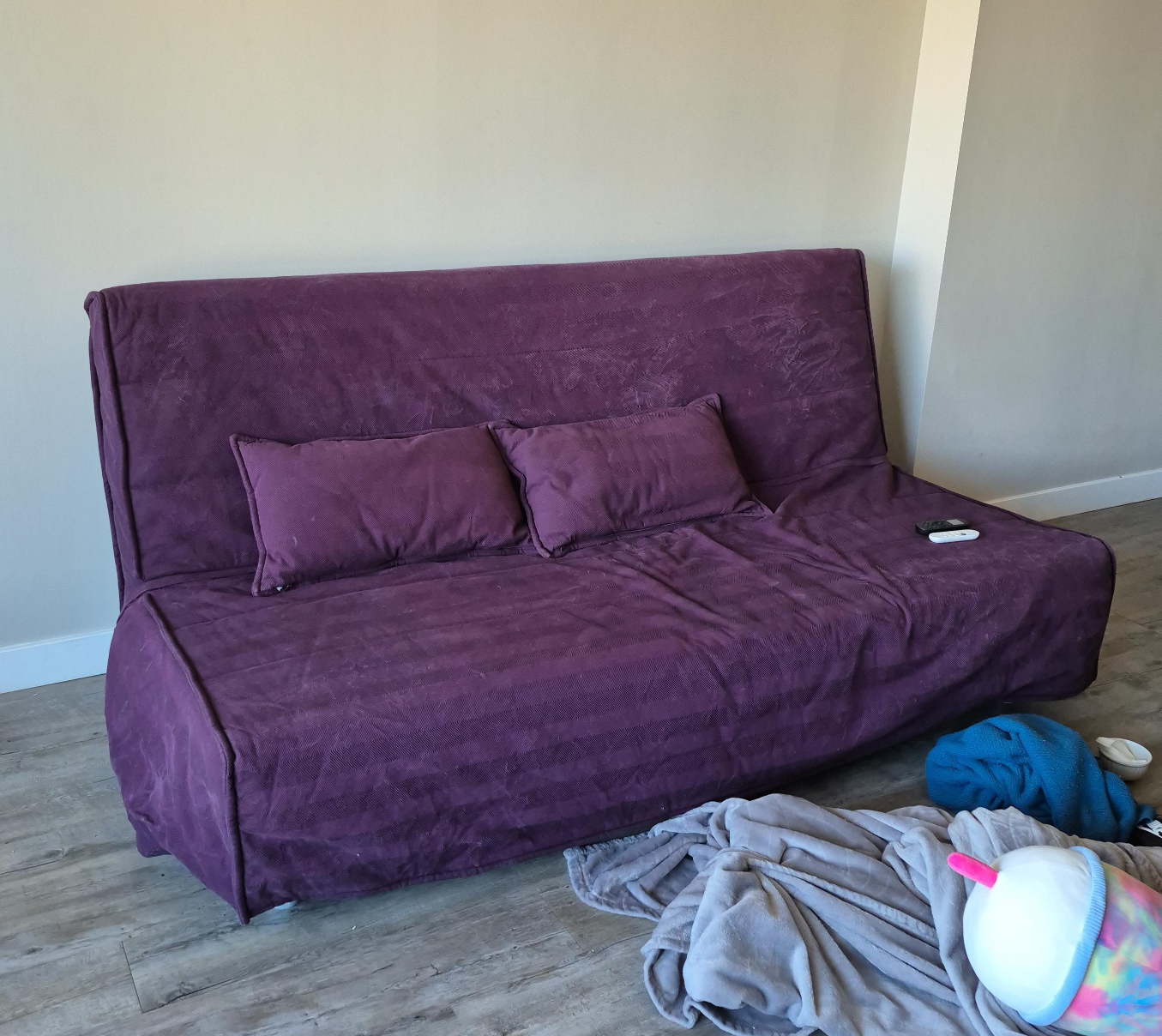 Purple Futon Sofa Bed with Pillows