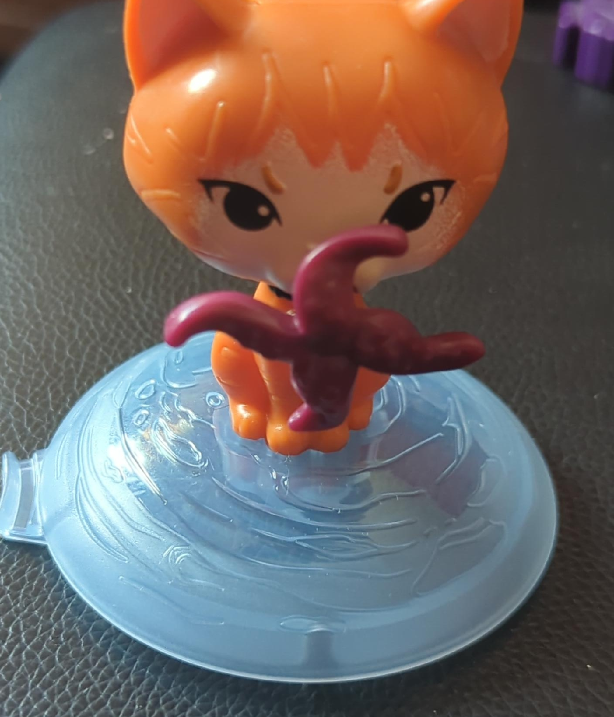 Orange Cat Figurine with Purple Bird thumbnail