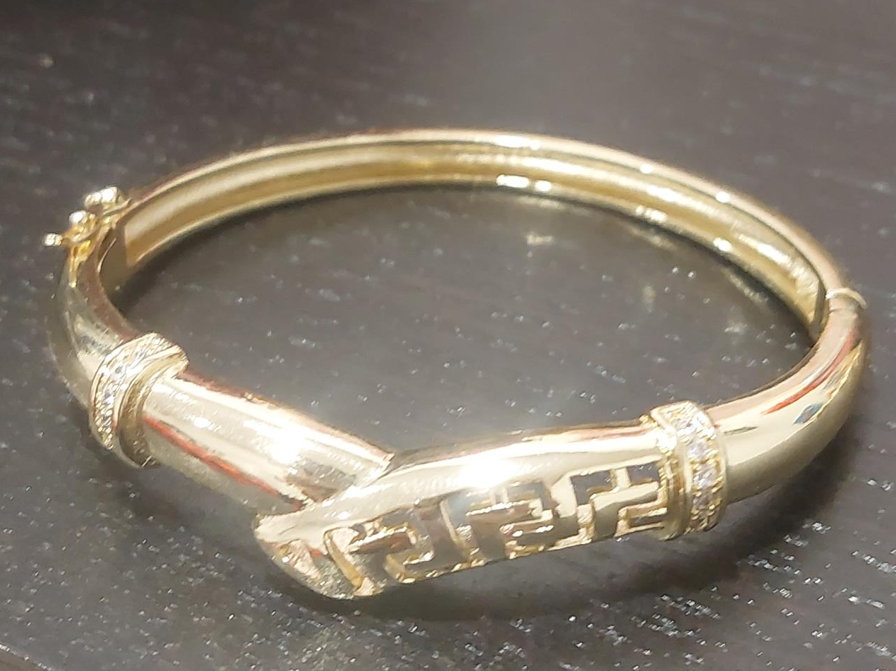 Gold-tone Bangle Bracelet with Greek Key Design thumbnail