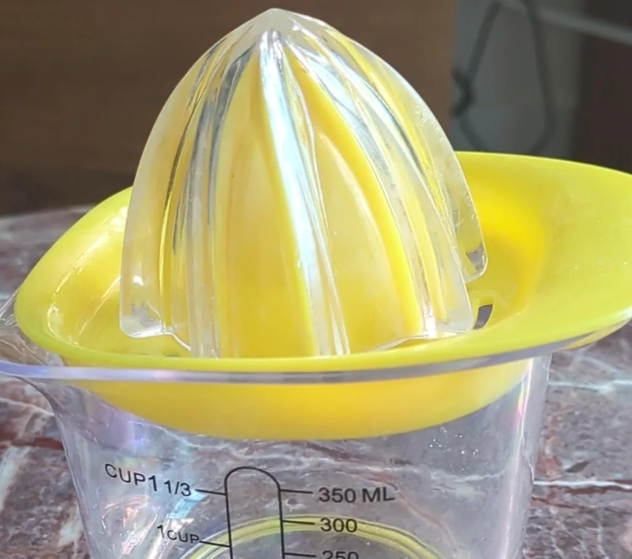 Yellow Lemon Squeezer with Measuring Cup