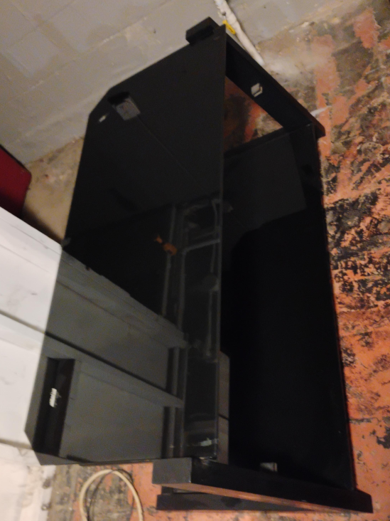 Black Glass TV Stand It's seen a lot of game time. thumbnail