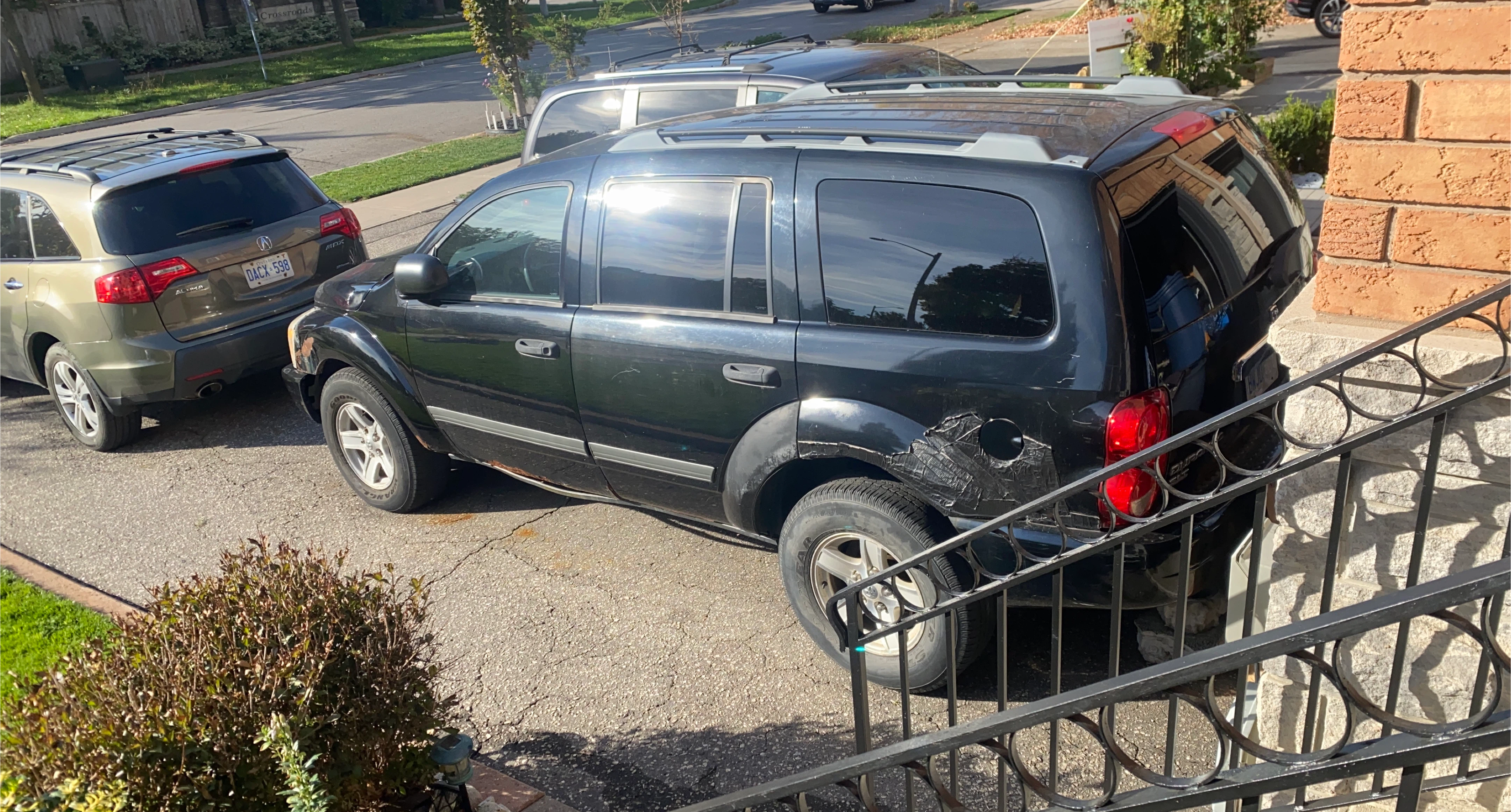 Damaged Black Dodge Durango SUV thumbnail