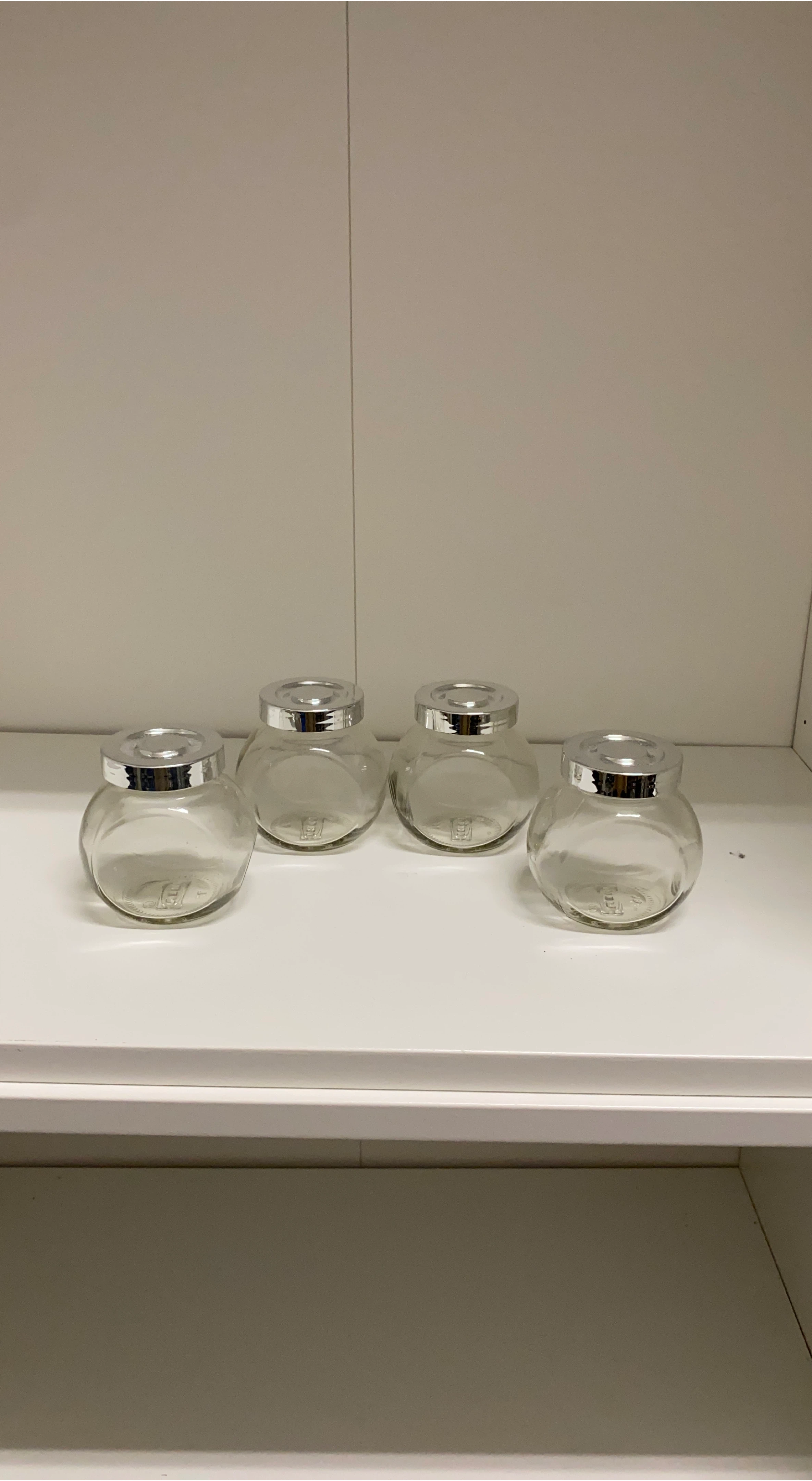 Four Clear Glass Jars with Silver Lids thumbnail