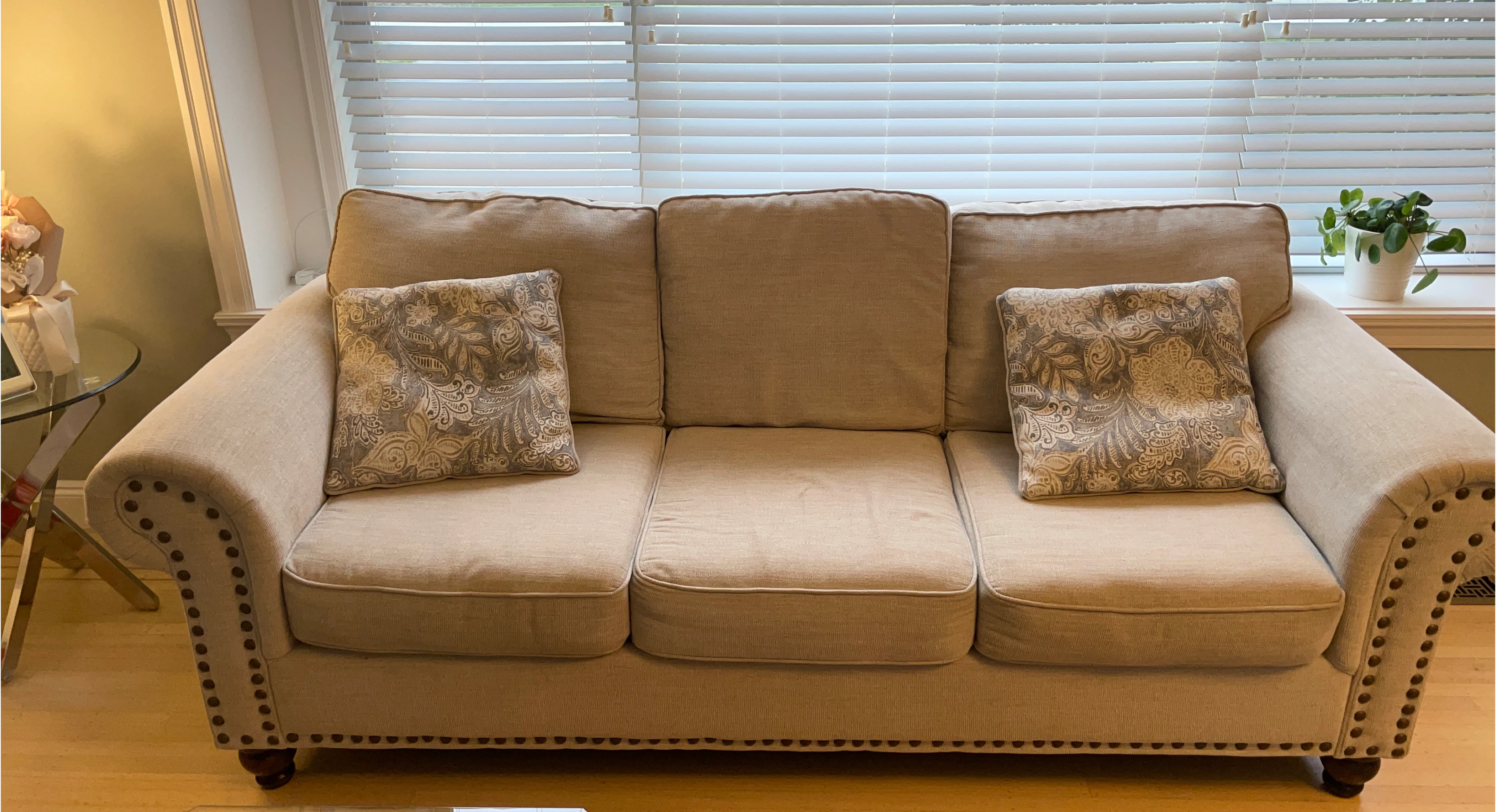 Beige Three-Seater Sofa with Pillows thumbnail