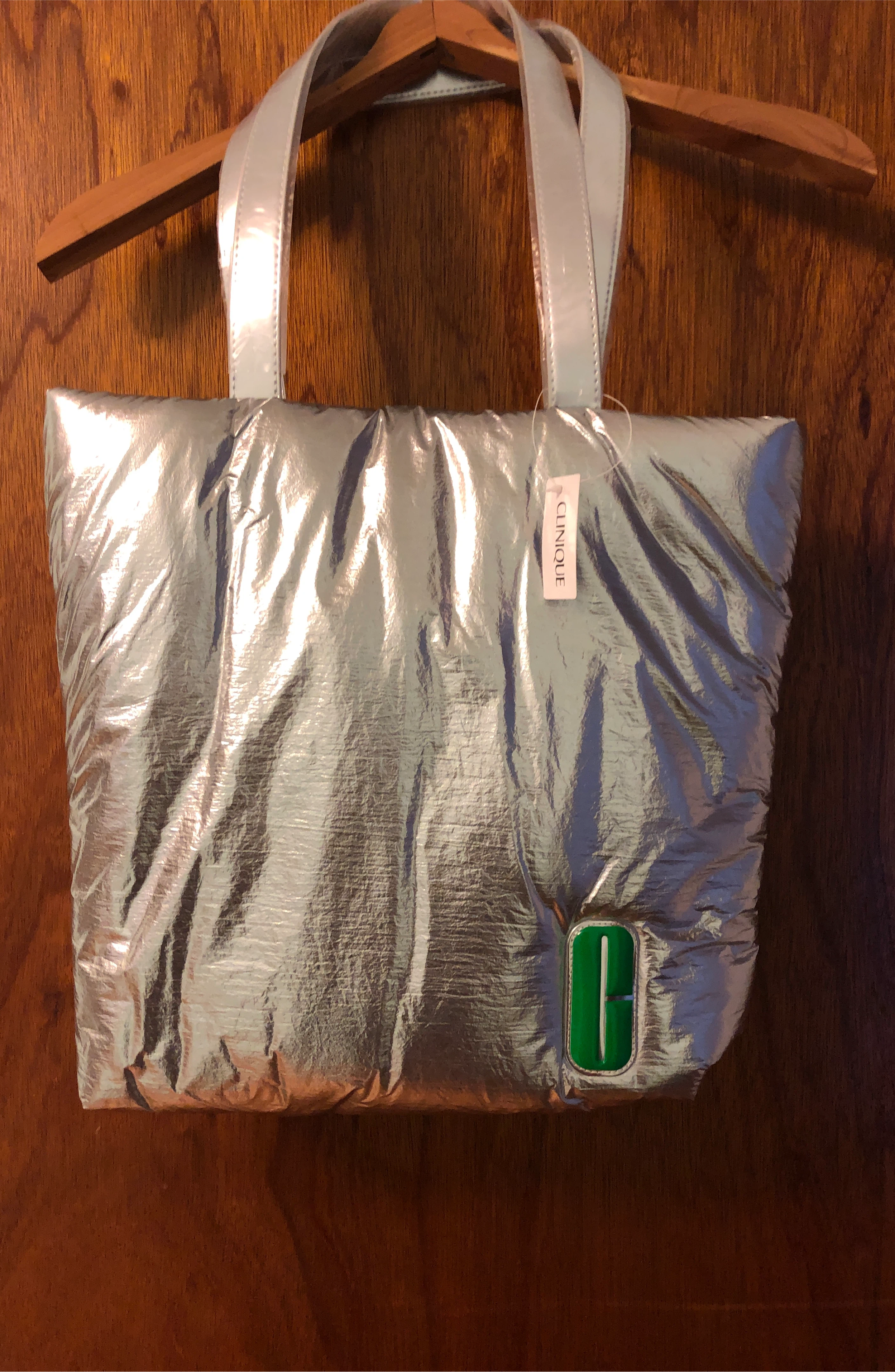 A New Clinique Silver Puffer Tote Bag thumbnail
