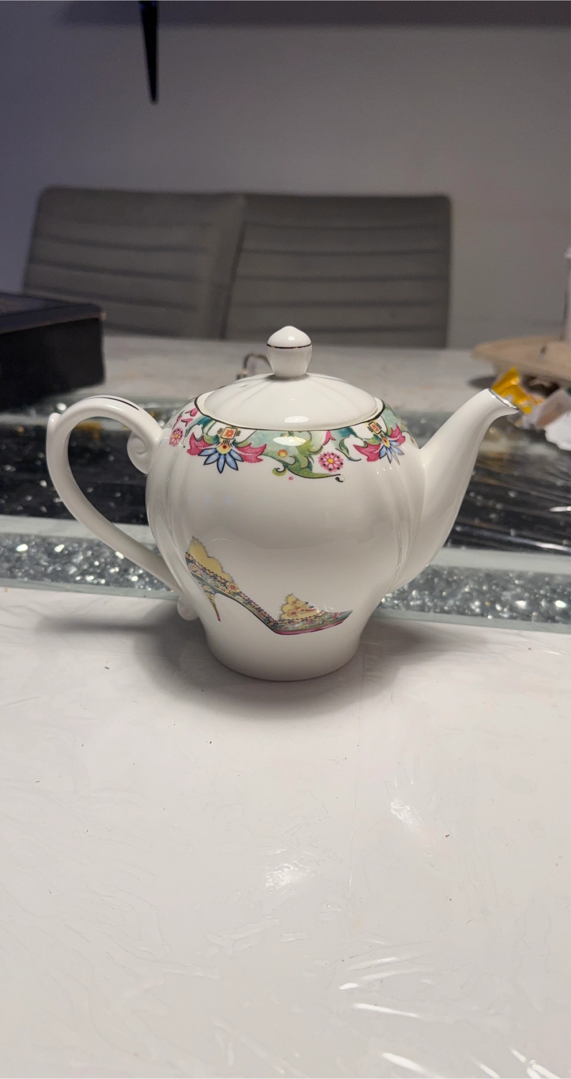 White Teapot with Floral and Shoe Design