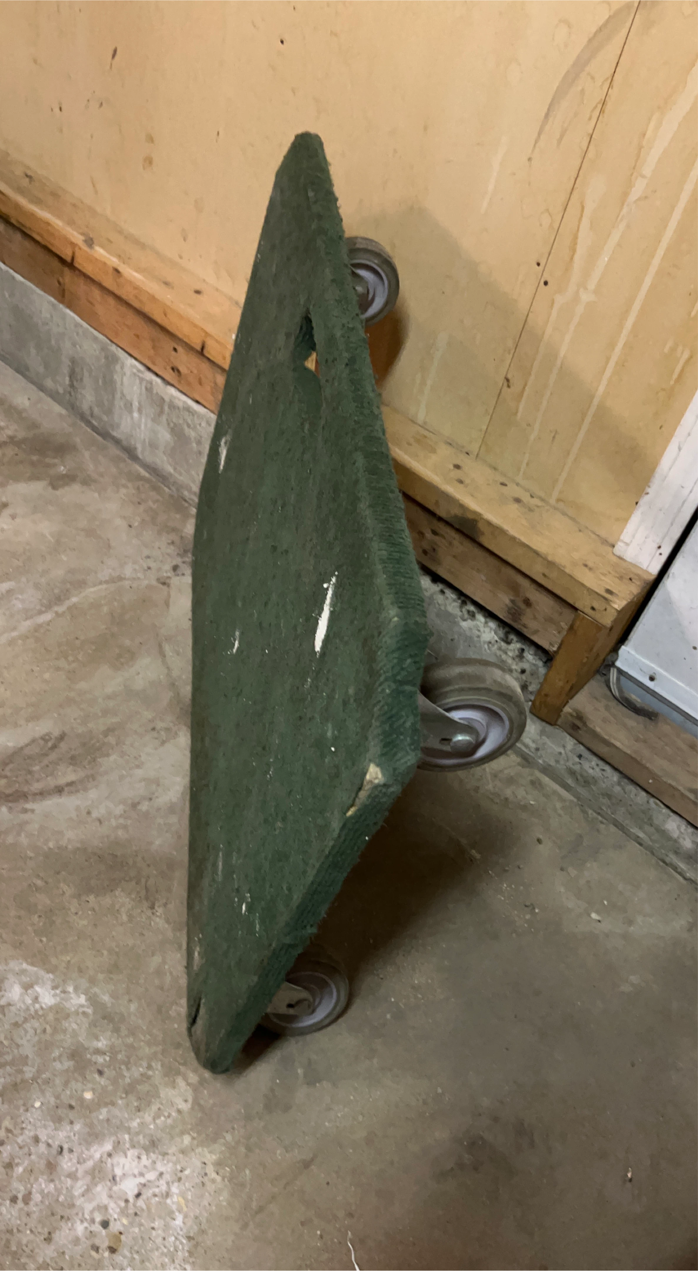 Green Carpeted Dolly with Wheels