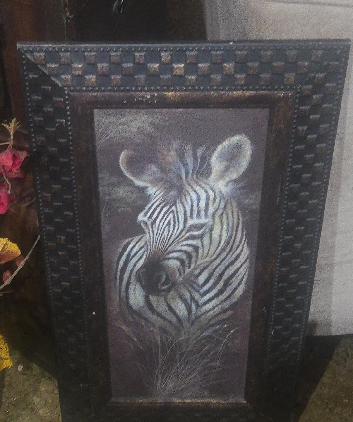 zebra print framed in braided wood