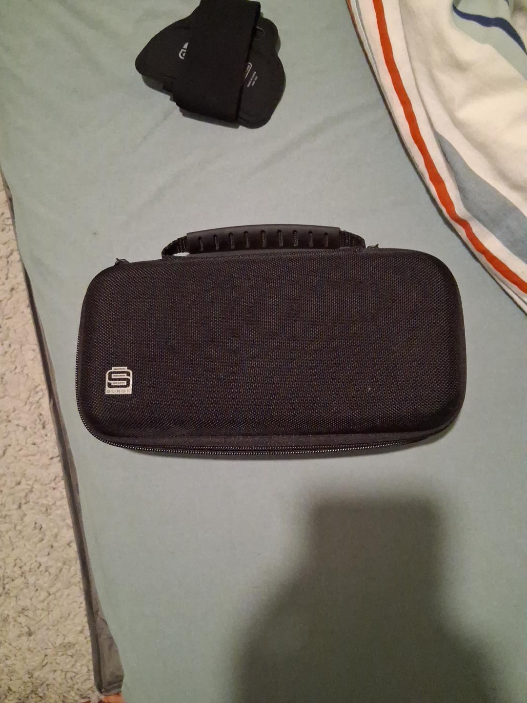 Surge Black Carrying Case for Nintendo Switch all sizes thumbnail
