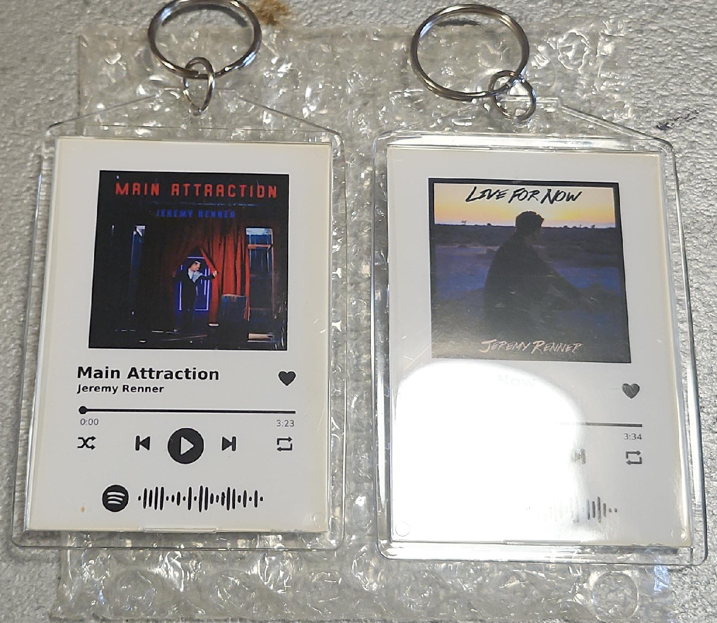 Set of 2 Jeremy Renner Spotify Keychains thumbnail