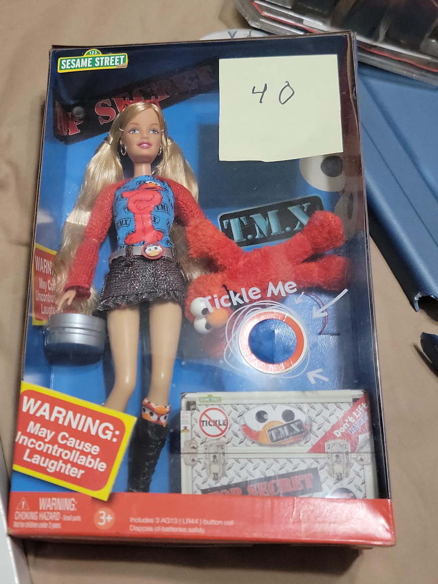 Sesame Street Barbie Loves T.M.X. Elmo Doll image indicator(1)