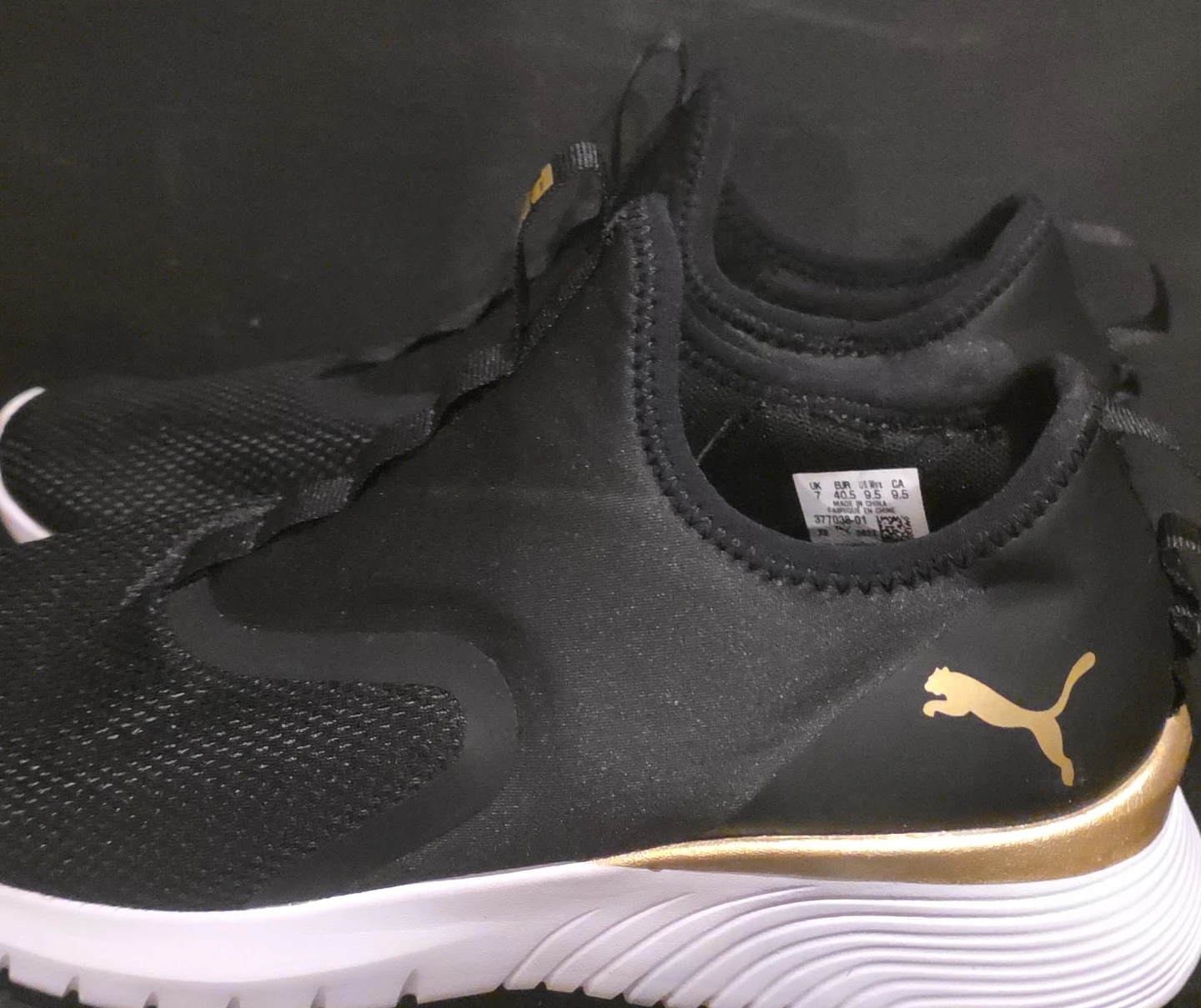 Puma Black & Gold Running Shoes - Women's Size 9.5 thumbnail