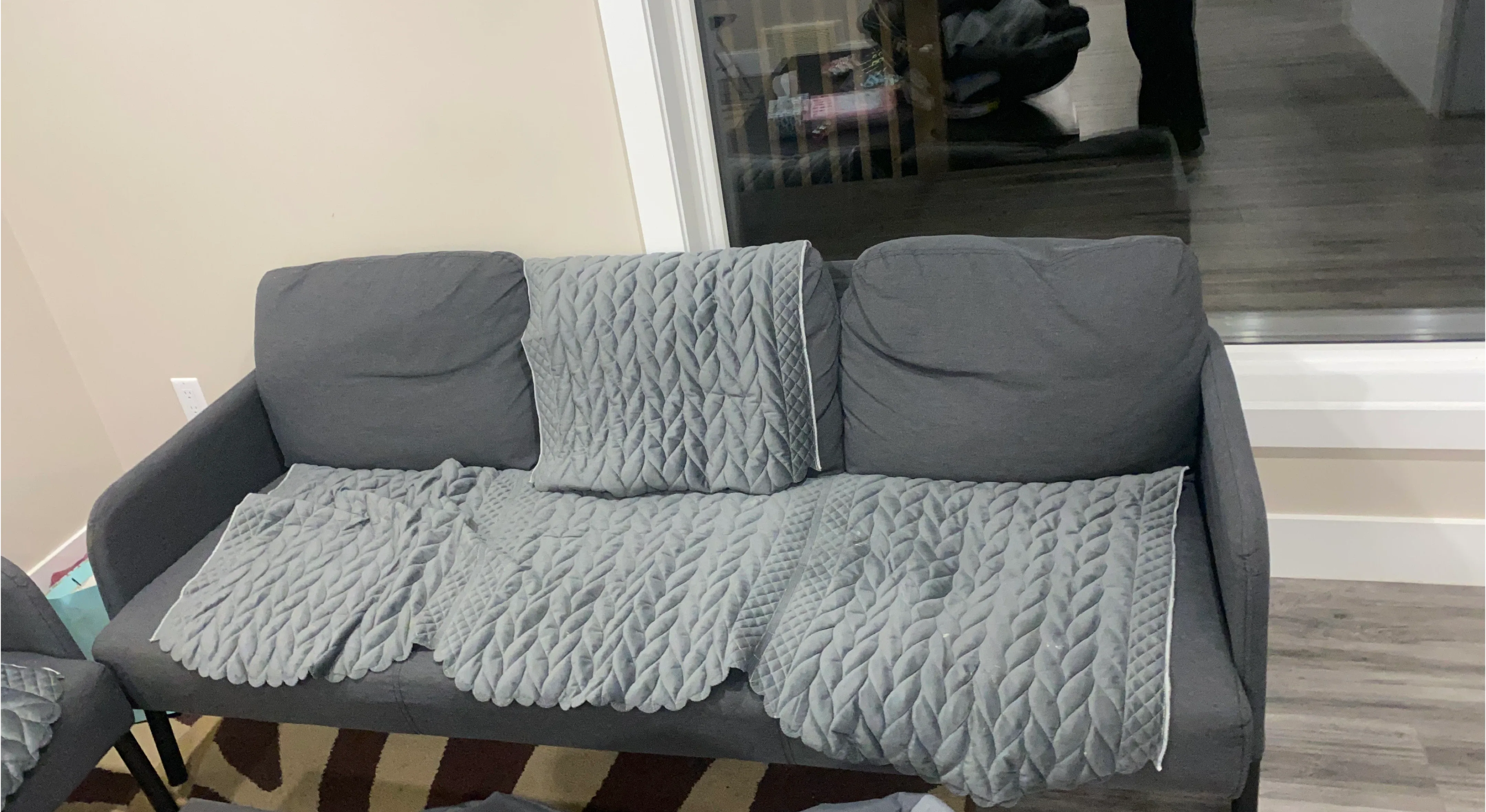 Grey Sofa with Quilted Cover