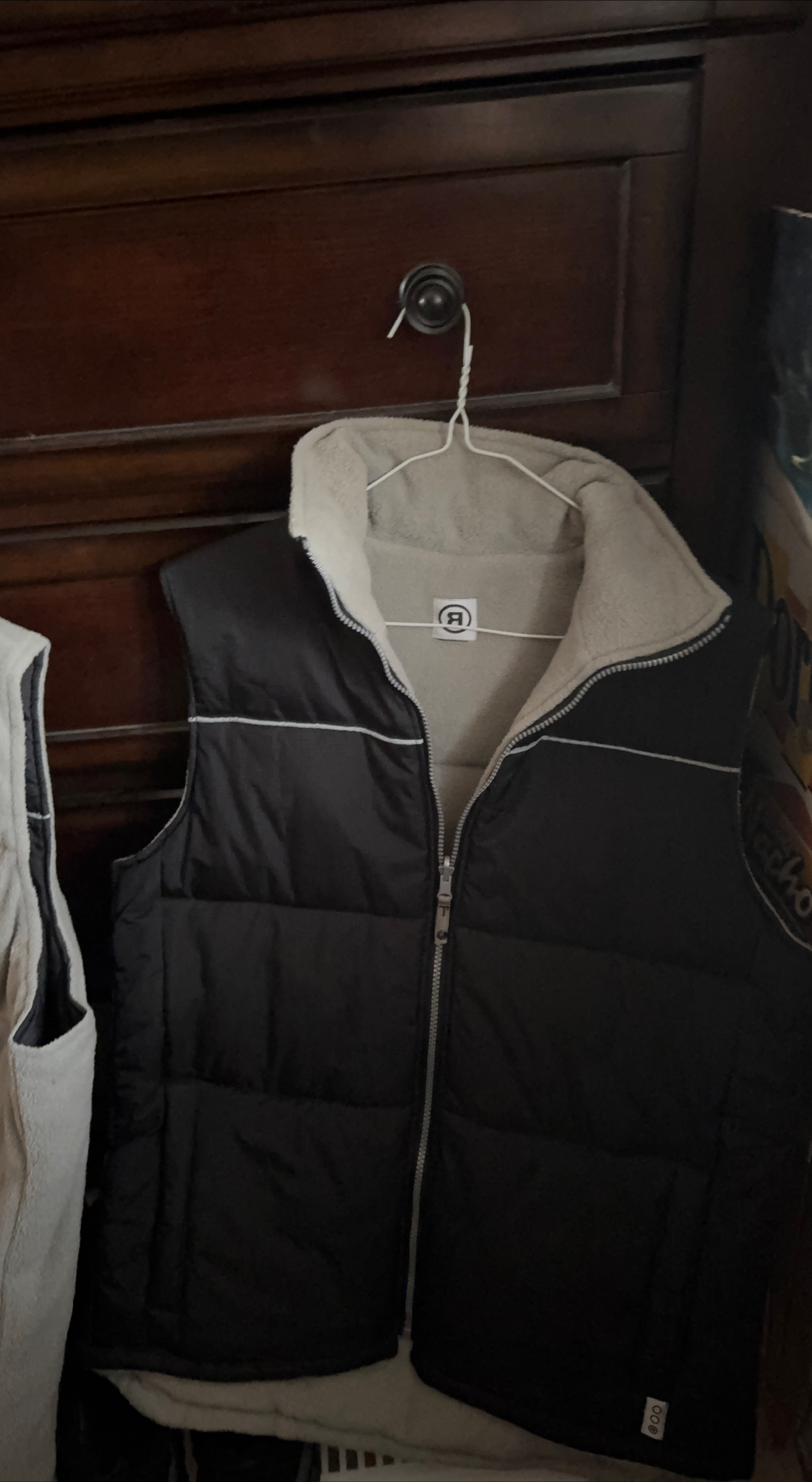 Black Reversible exterior vest, grey fleece liner