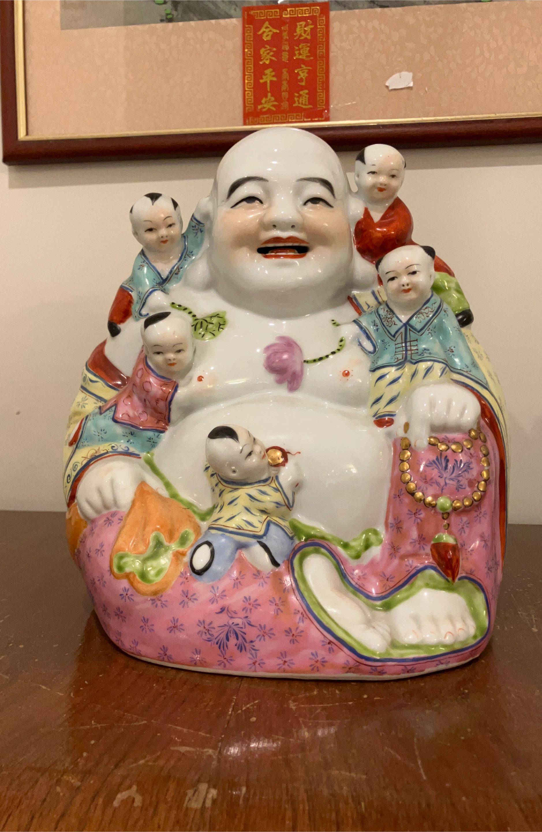 Smiling Buddha Statue with Children image indicator(1)