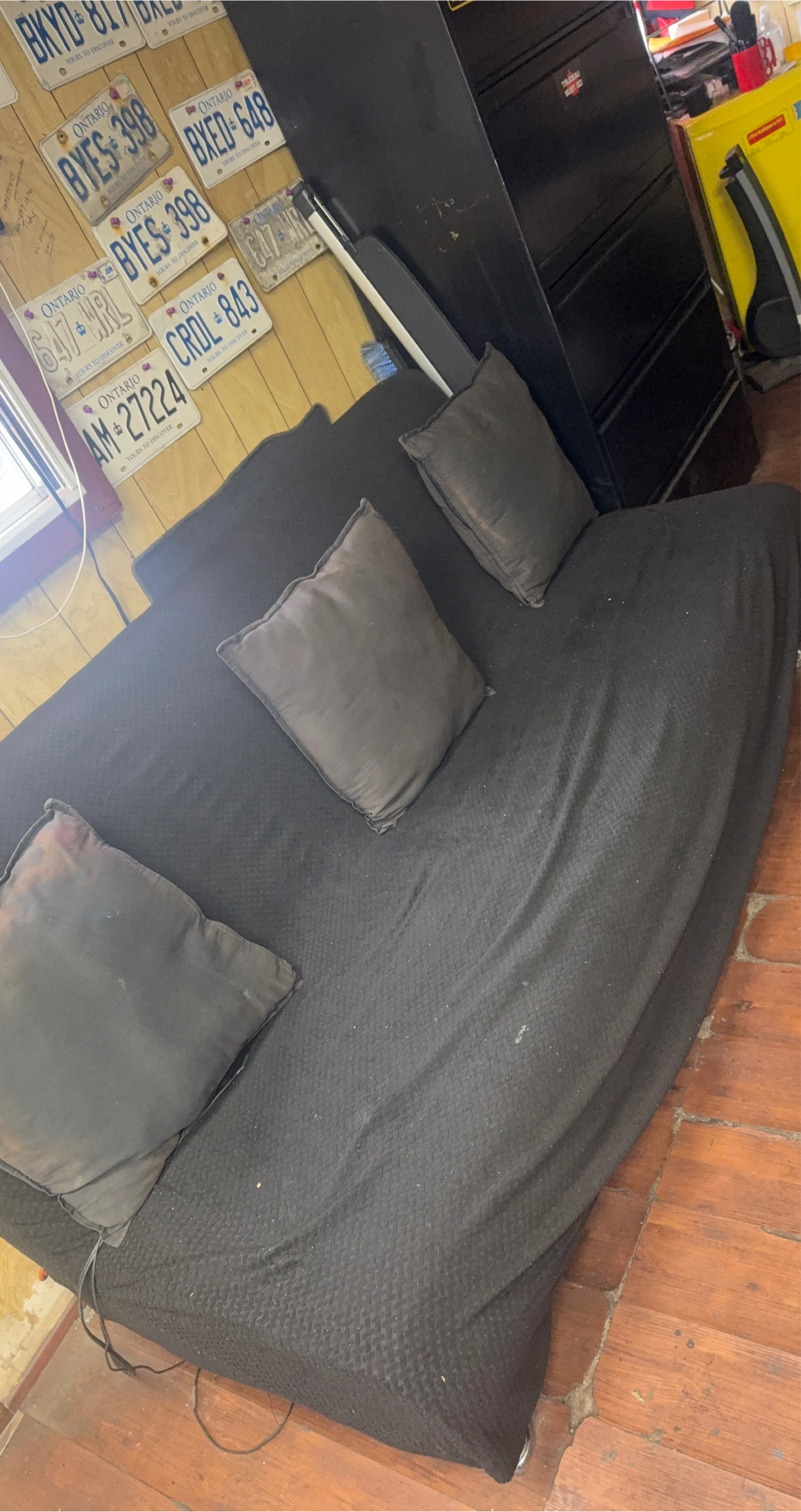 Black Futon Sofa Bed with Pillows
