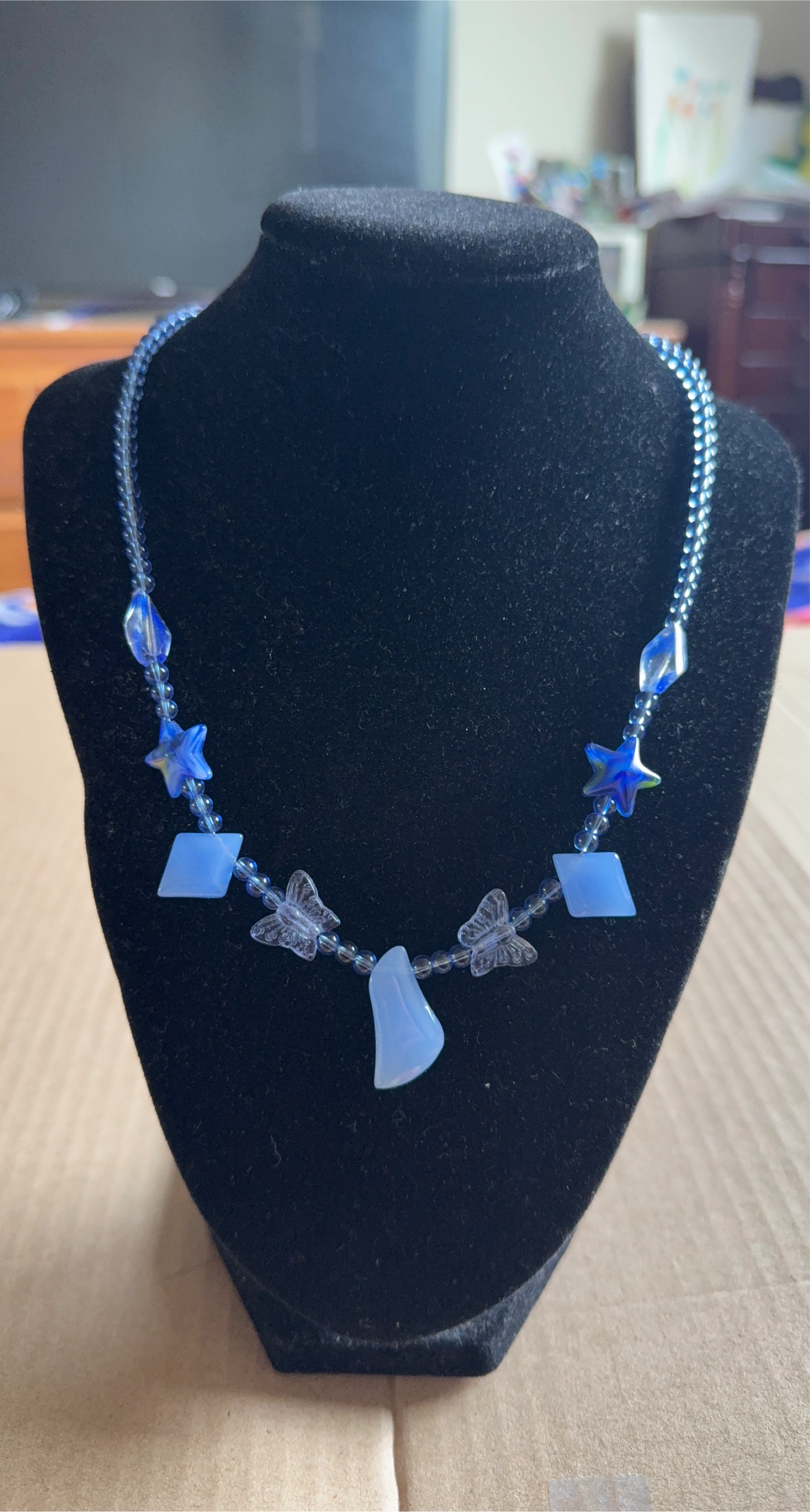 Blue glassBeaded Necklace with Star & Butterfly Charms