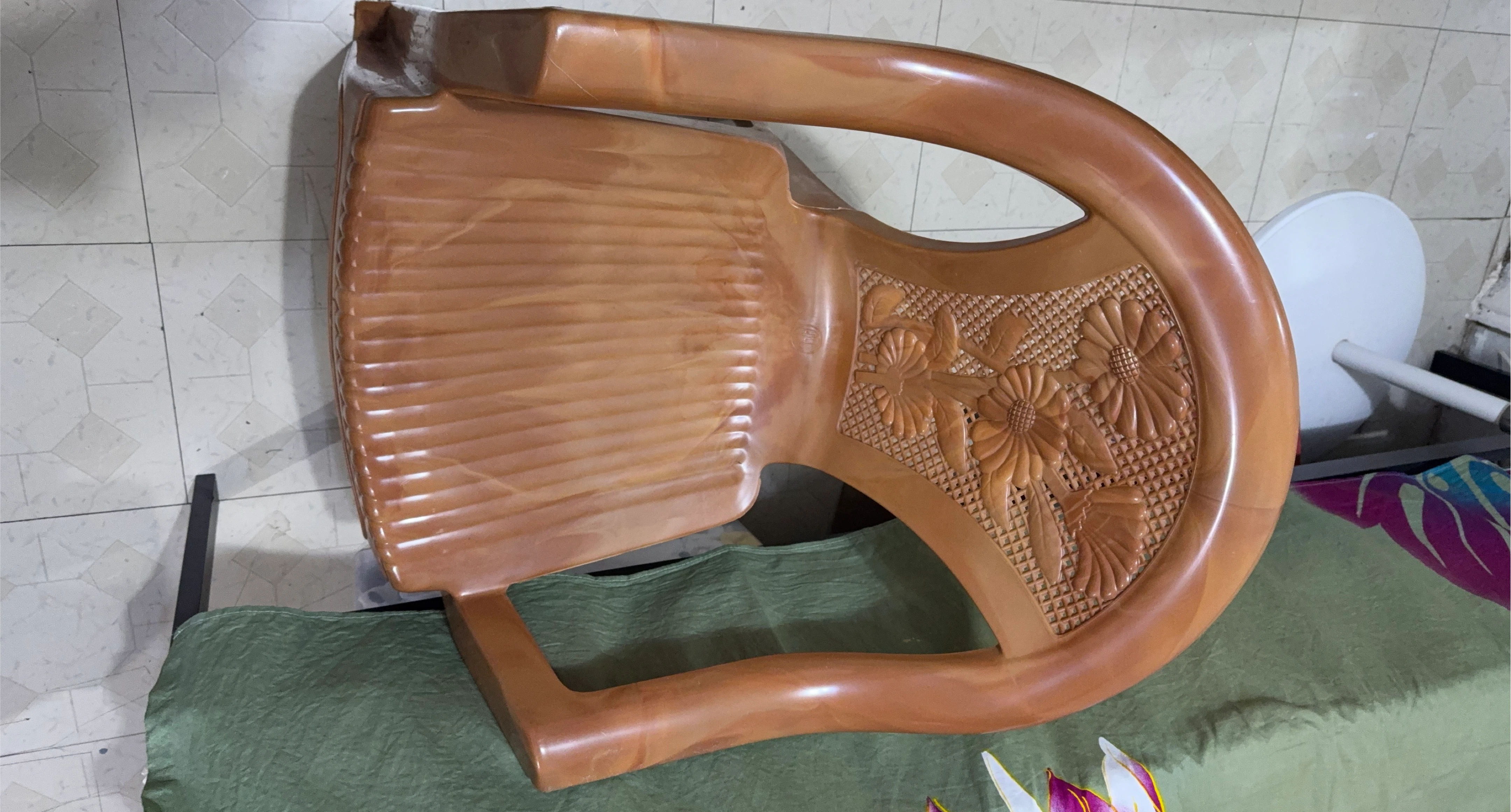 Plastic Chair with Floral Carvings