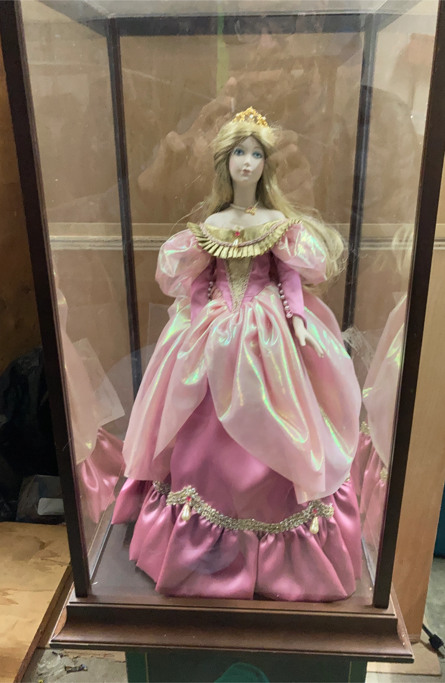 Porcelain Doll in Display Case