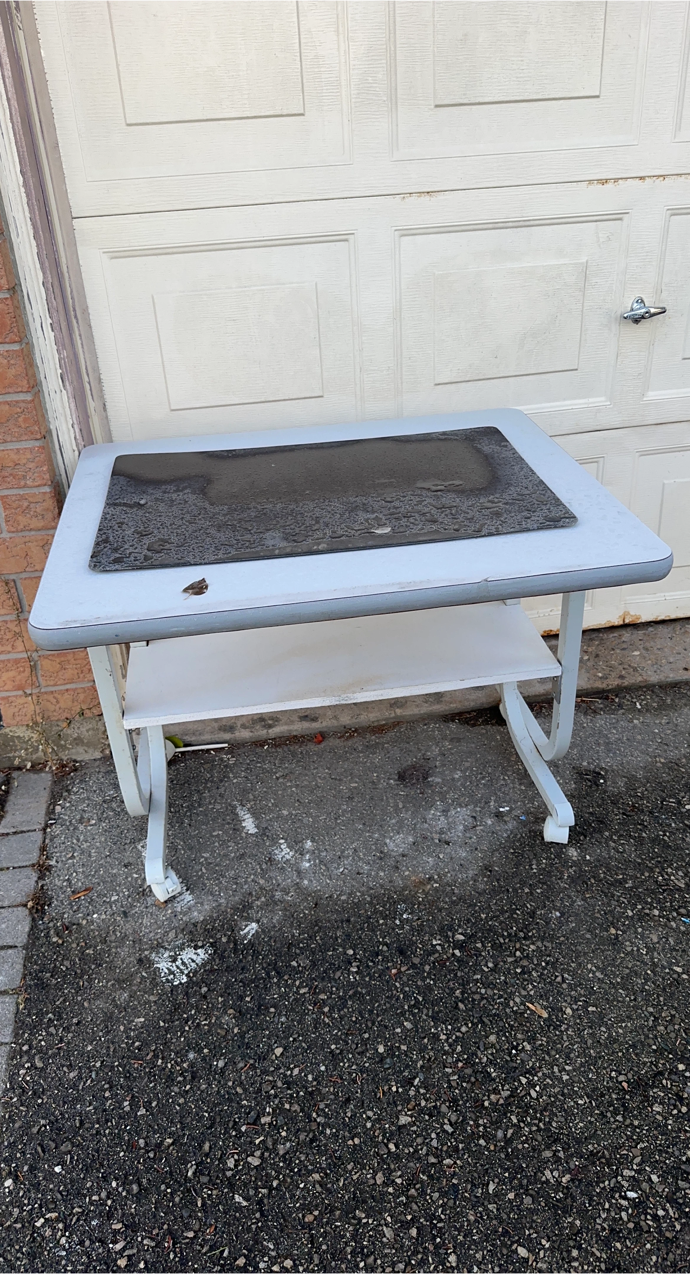 Vintage metal side table with shelf