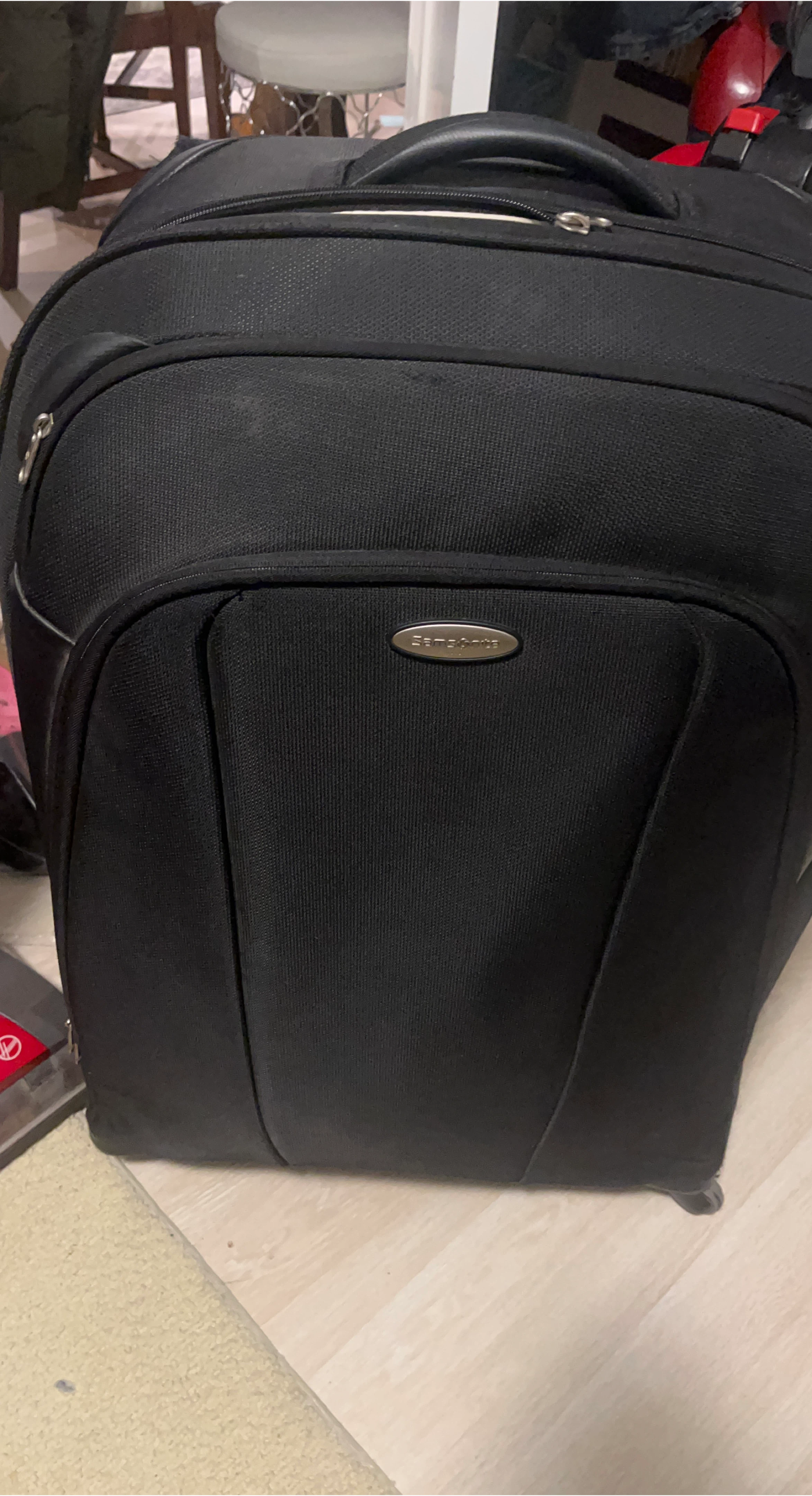 Samsonite Black Rolling Suitcase