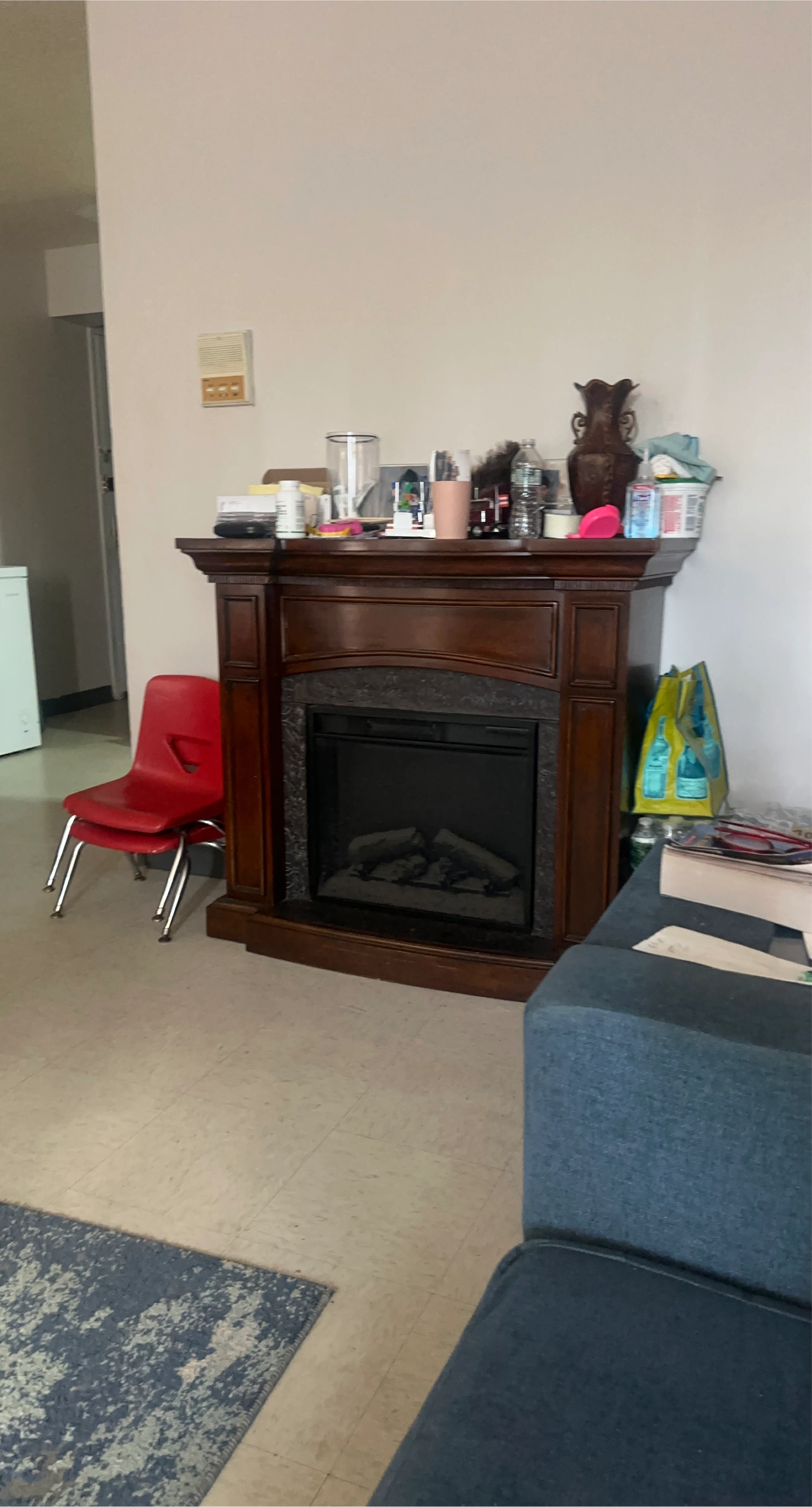 Fireplace with dark wood trim