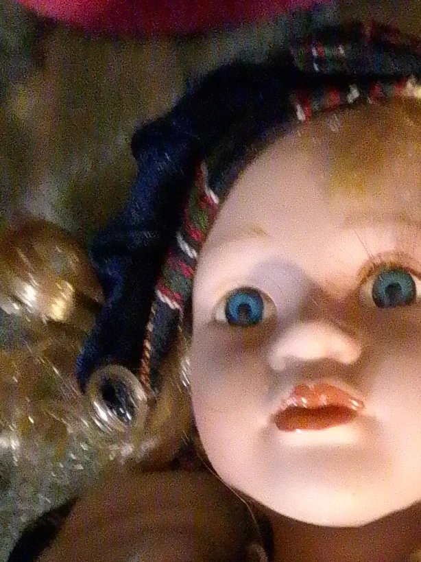 Vintage Porcelain Doll with Blue Eyes