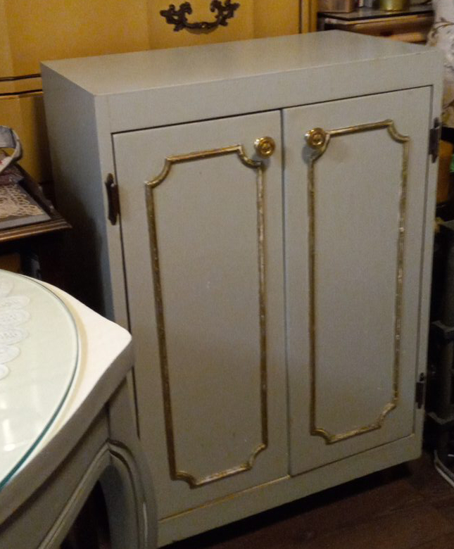 Cabinet with Gold Trim thumbnail