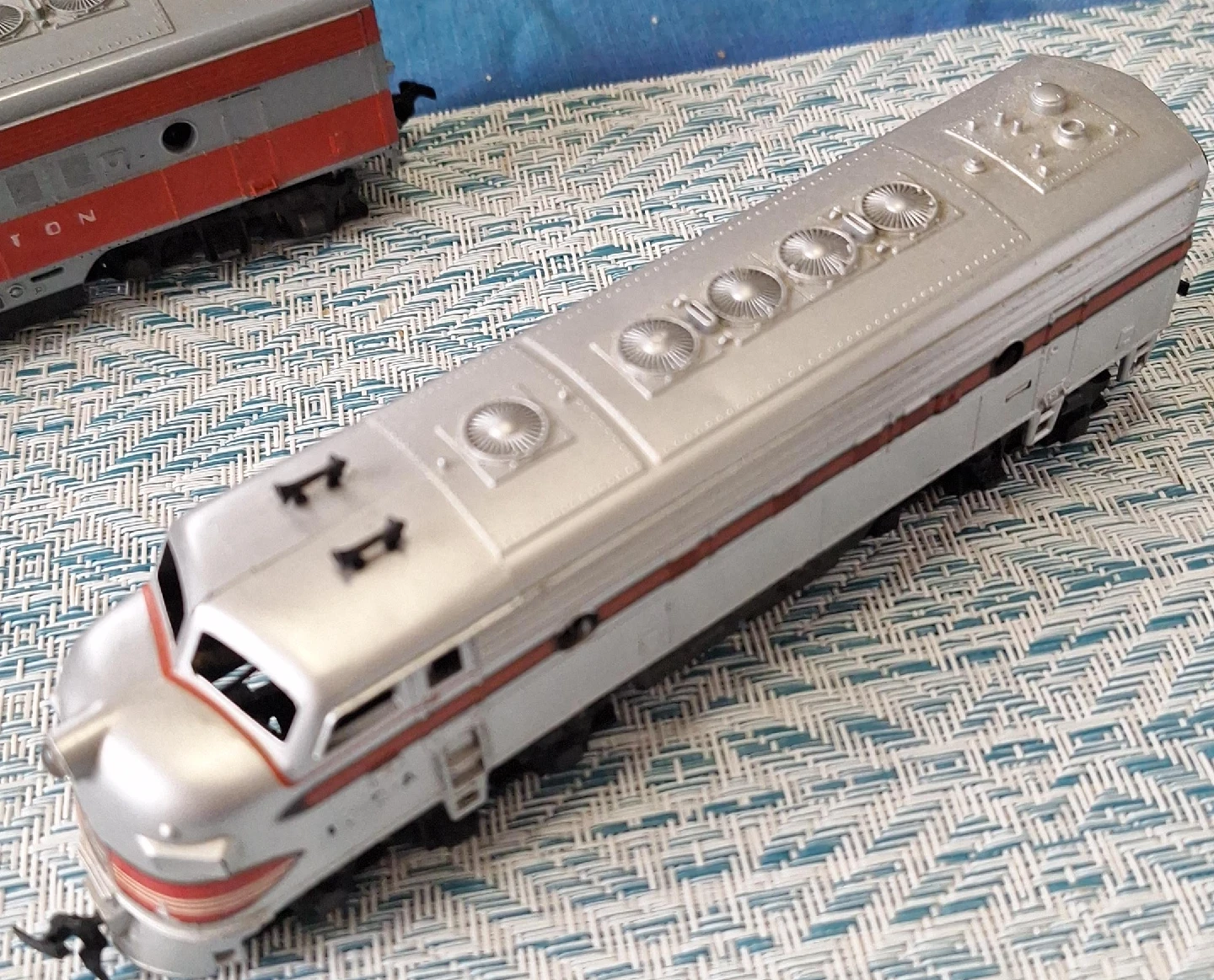 Silver and Red Model Train Engine