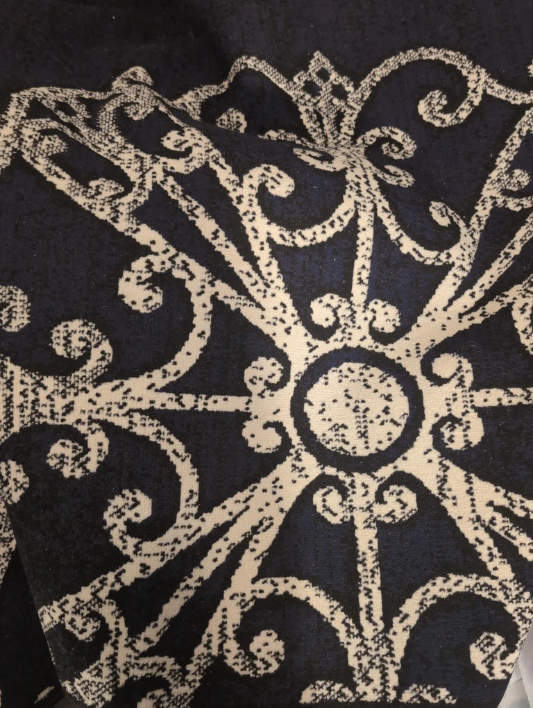 Black & Beige Patterned Area Rug