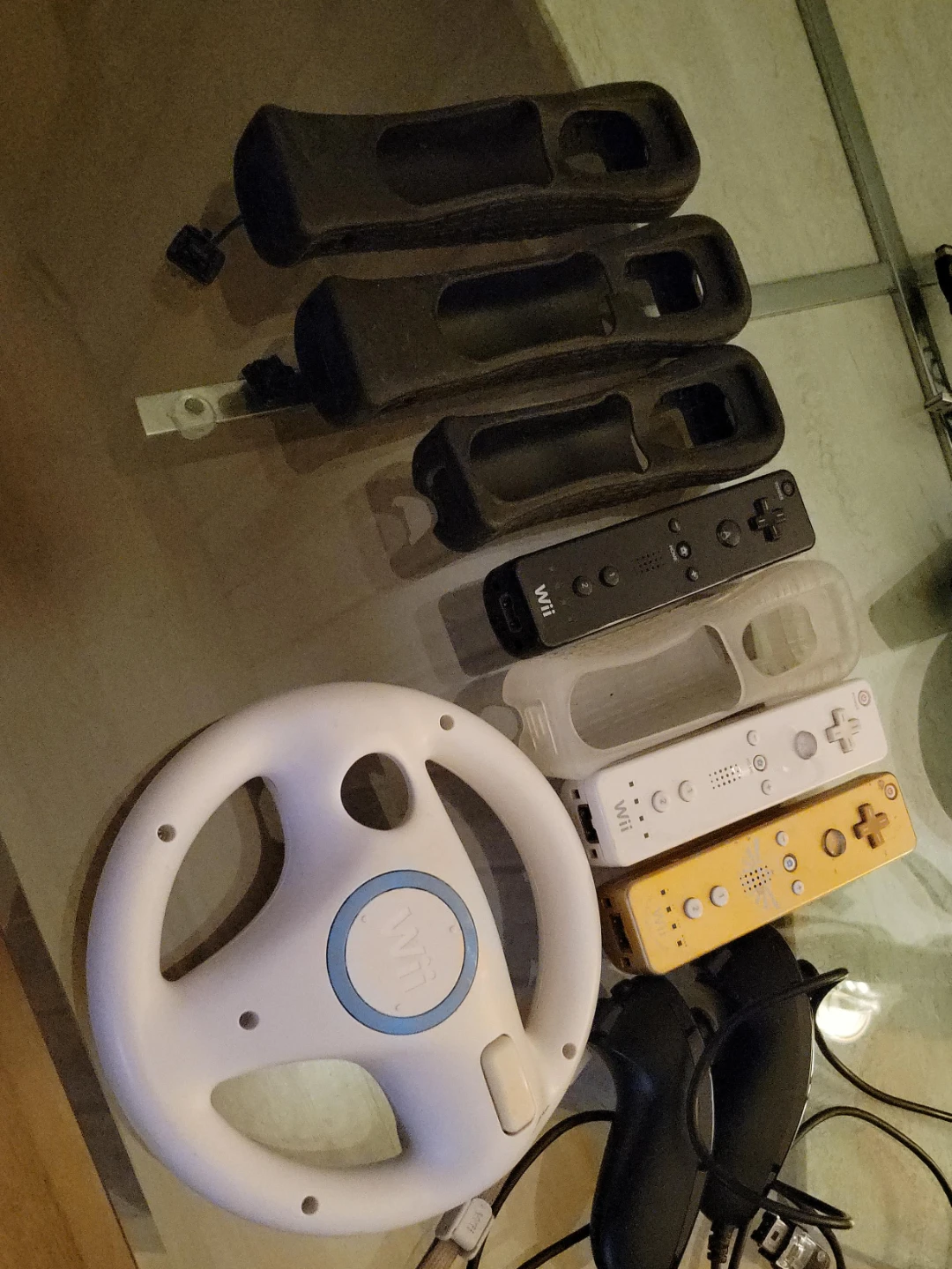 Nintendo Wii Remotes & Wheel thumbnail