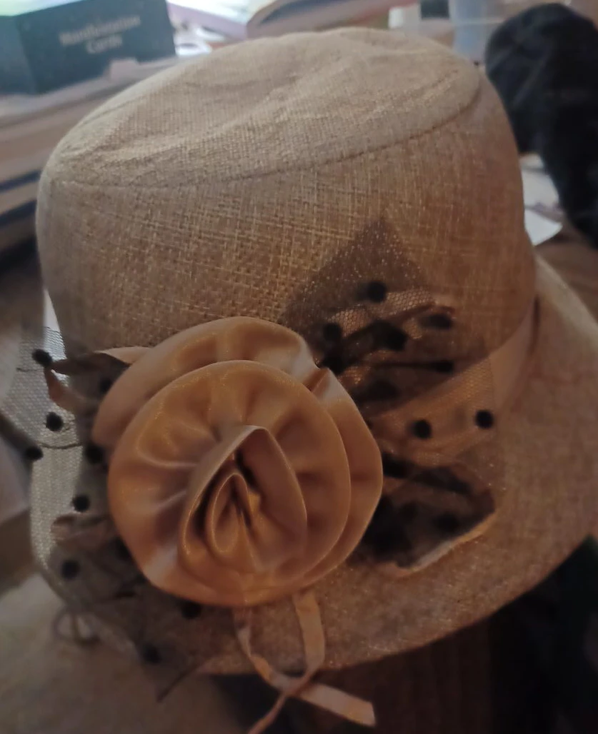 Elegant Beige Dress Hat with Floral Detail