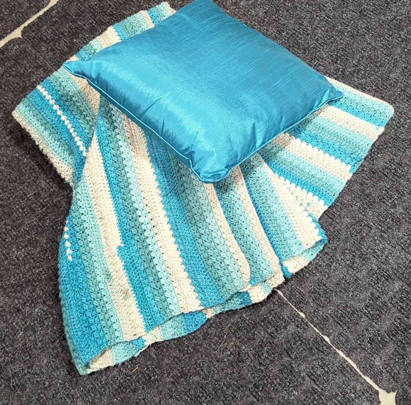 Blue Throw Pillow and Crochet Blanket