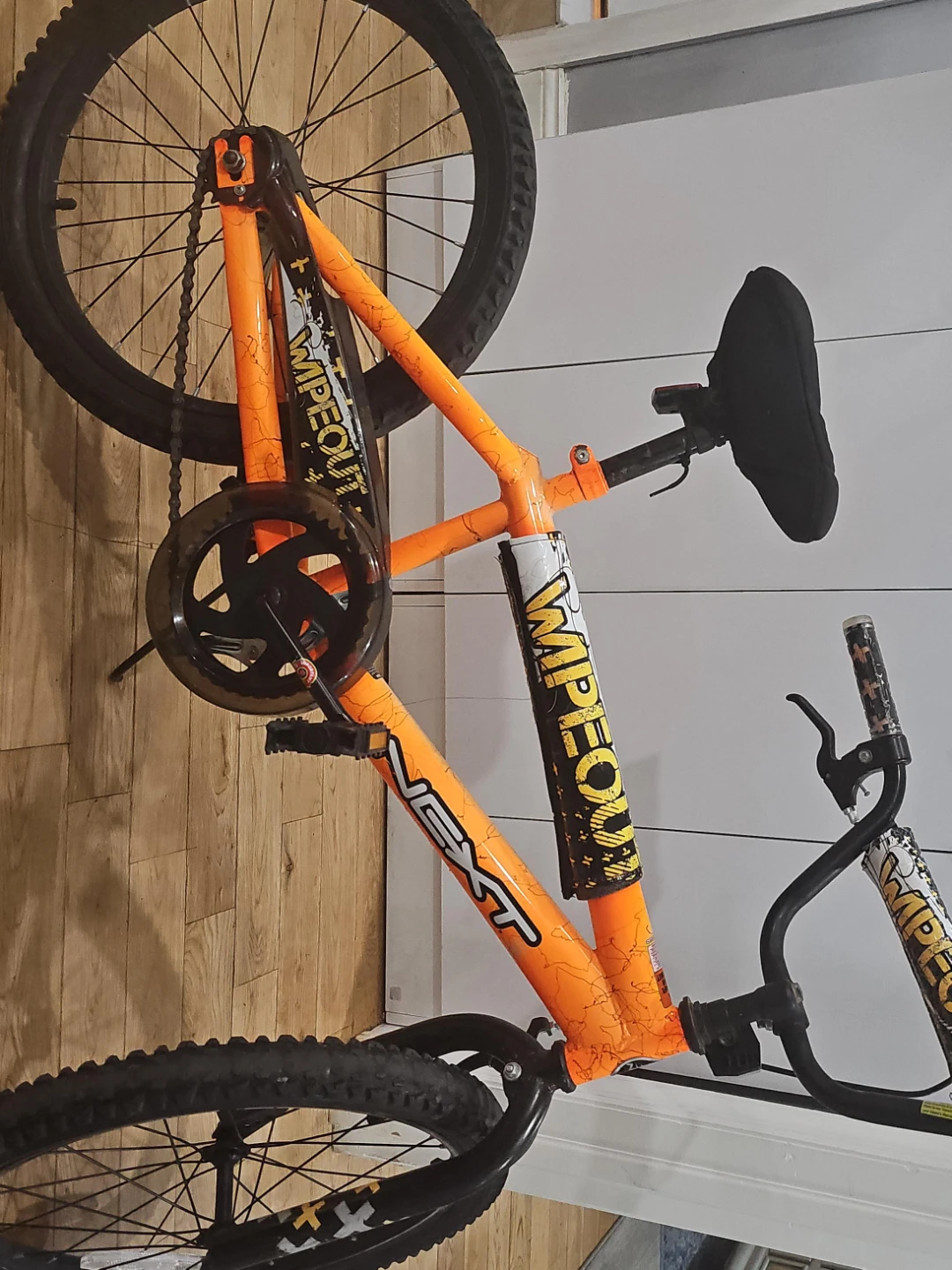 NEXT Wipeout Orange Bike