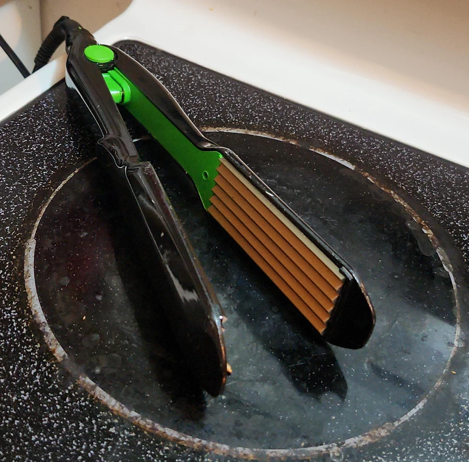 Fer à cheveux ondulé