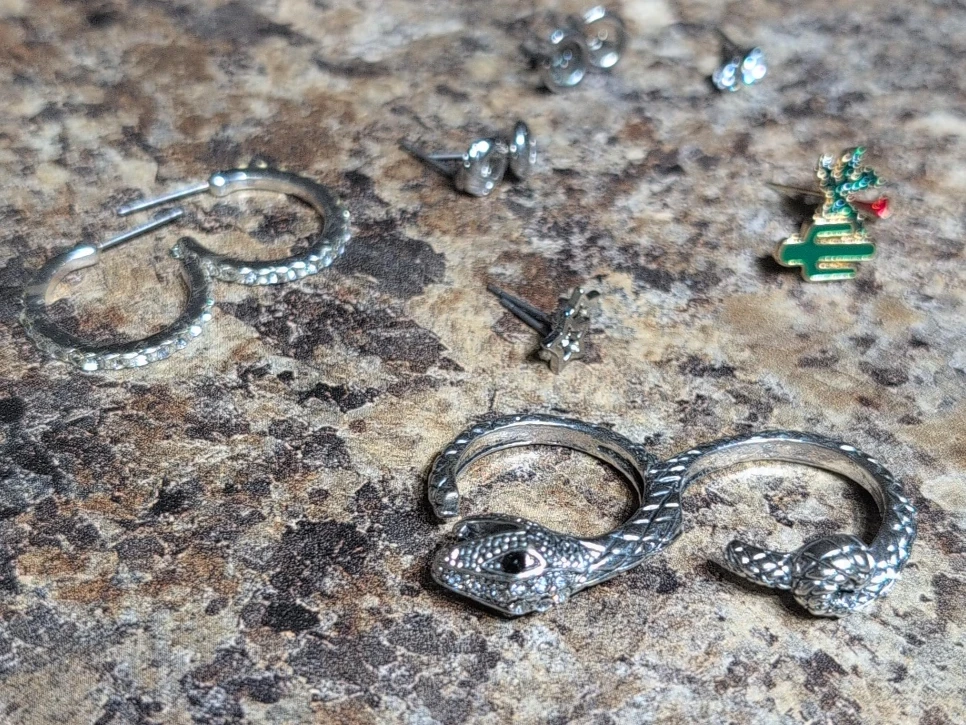Assorted Earrings and Snake Ring.