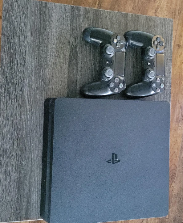 PlayStation 4 Console with 2 Controllers