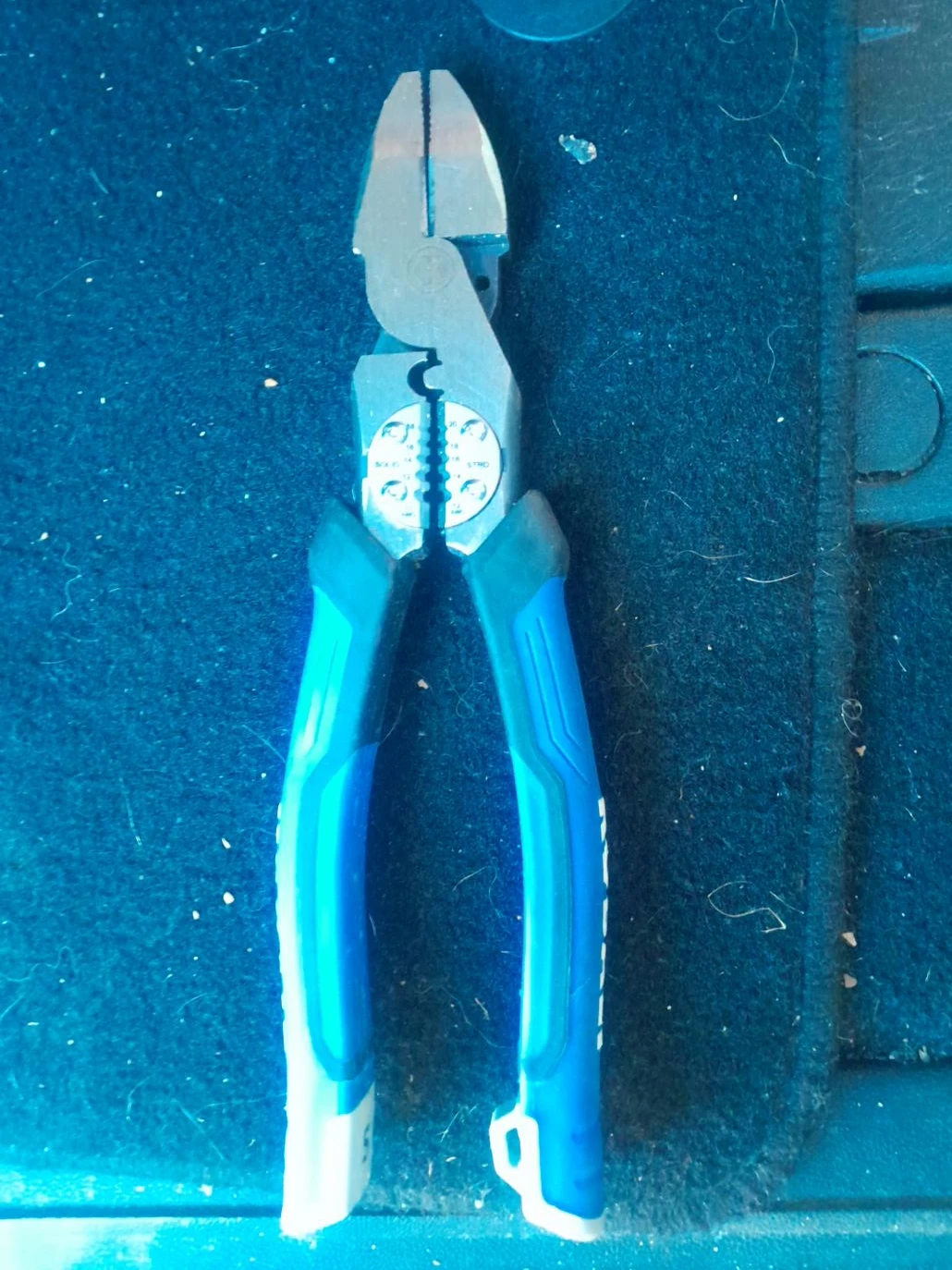 Blue handled pliers