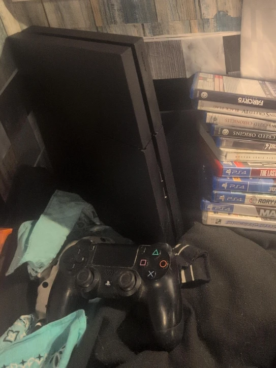 PlayStation 4 with Controller and Games thumbnail