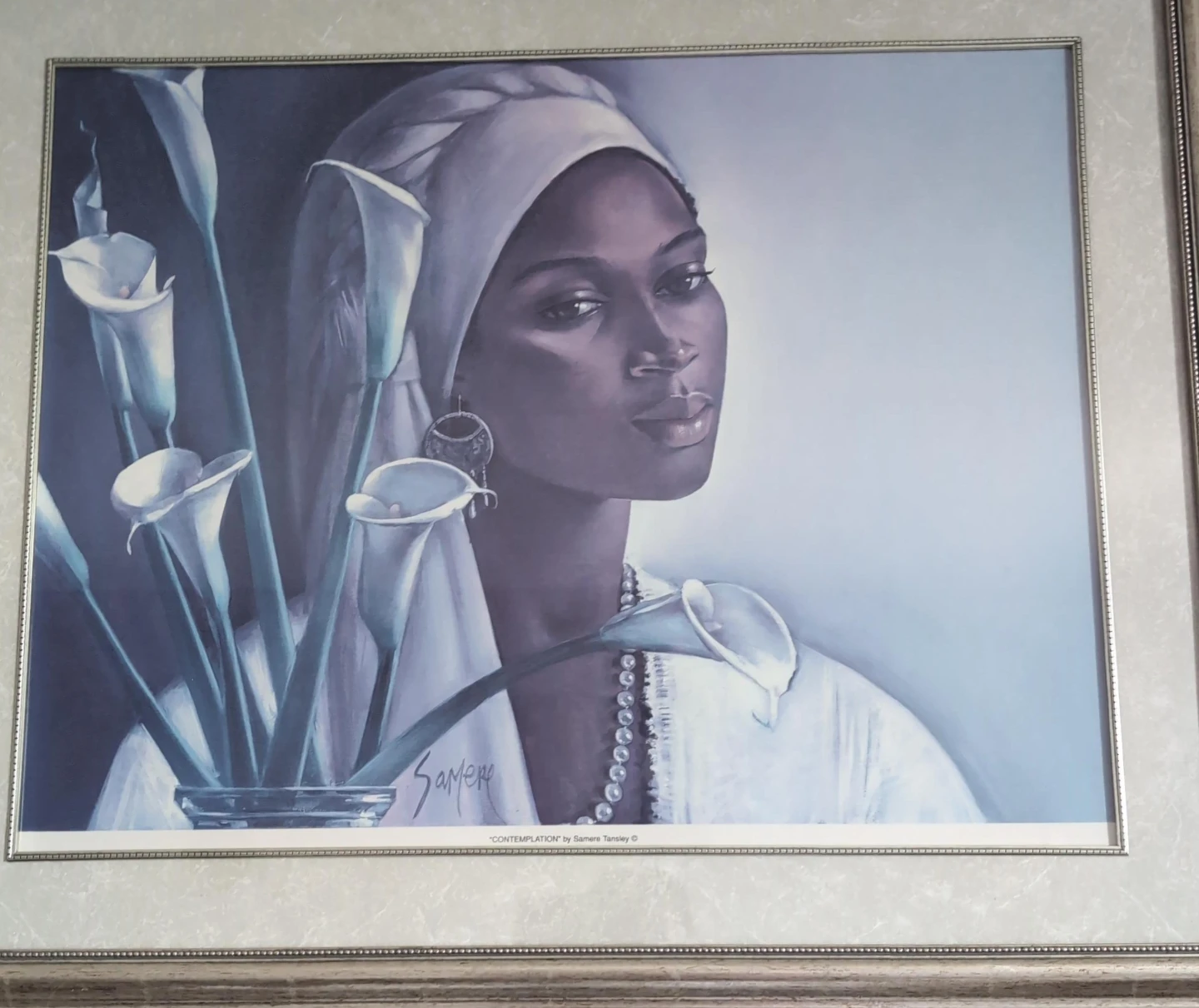 Beautiful woman, with Lillie's, contemplating...