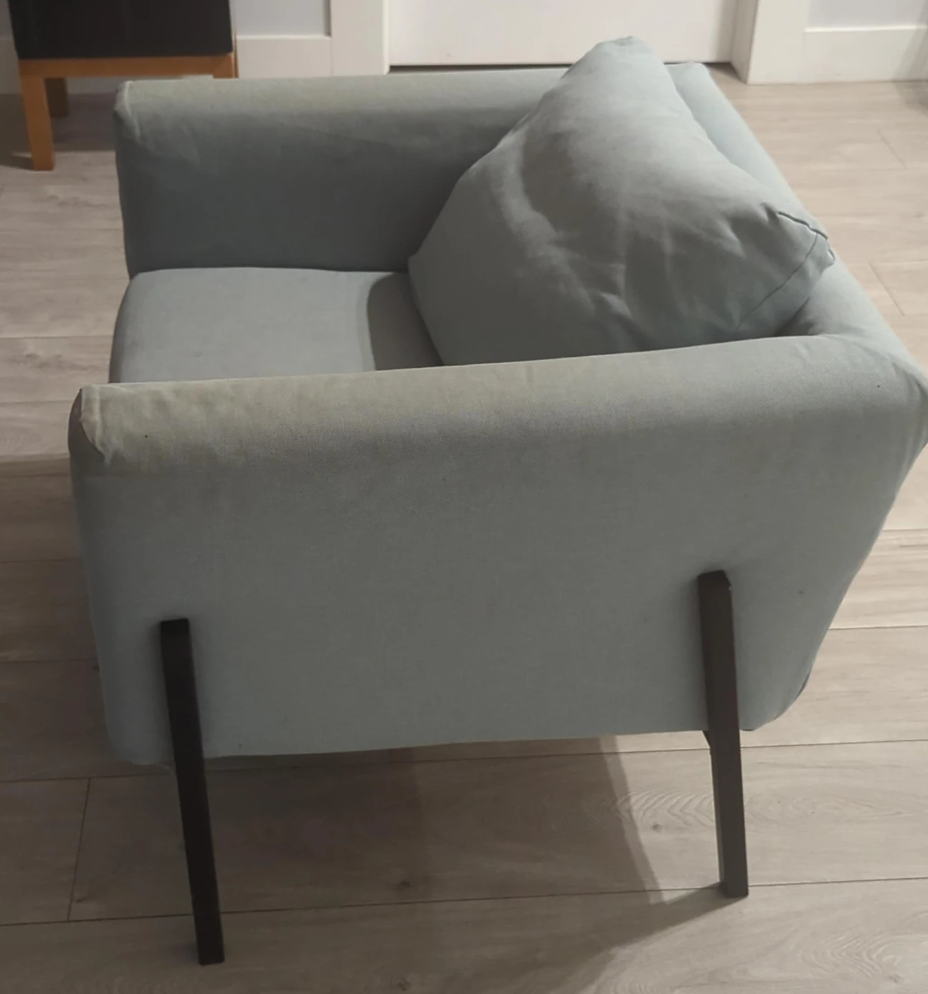 Light Grey Ikea Koarp Armchair with back pockets