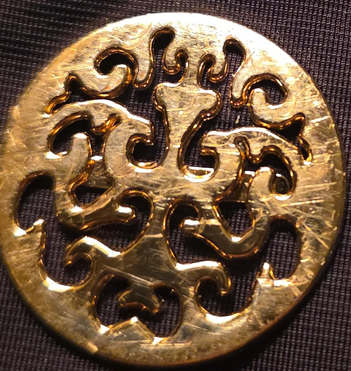 Gold-tone filigree circular pendant