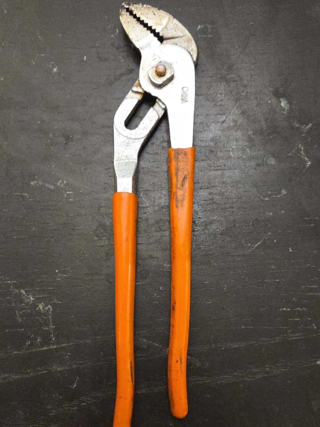 Used Orange Handle Pliers
