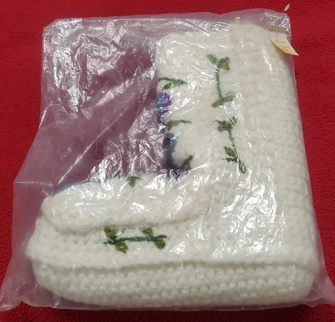 New White Knitted Booties with Floral Design image indicator(1)